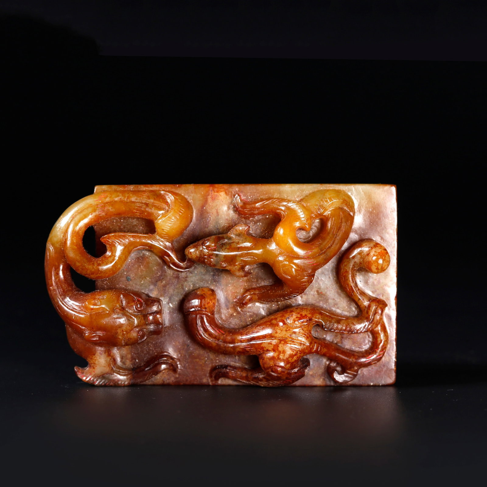 A ANCIENT JADE PLAQUE CARVED WITH DRAGON PATTERNS: Ancient Jade Plaque Carved with Dragon Patterns