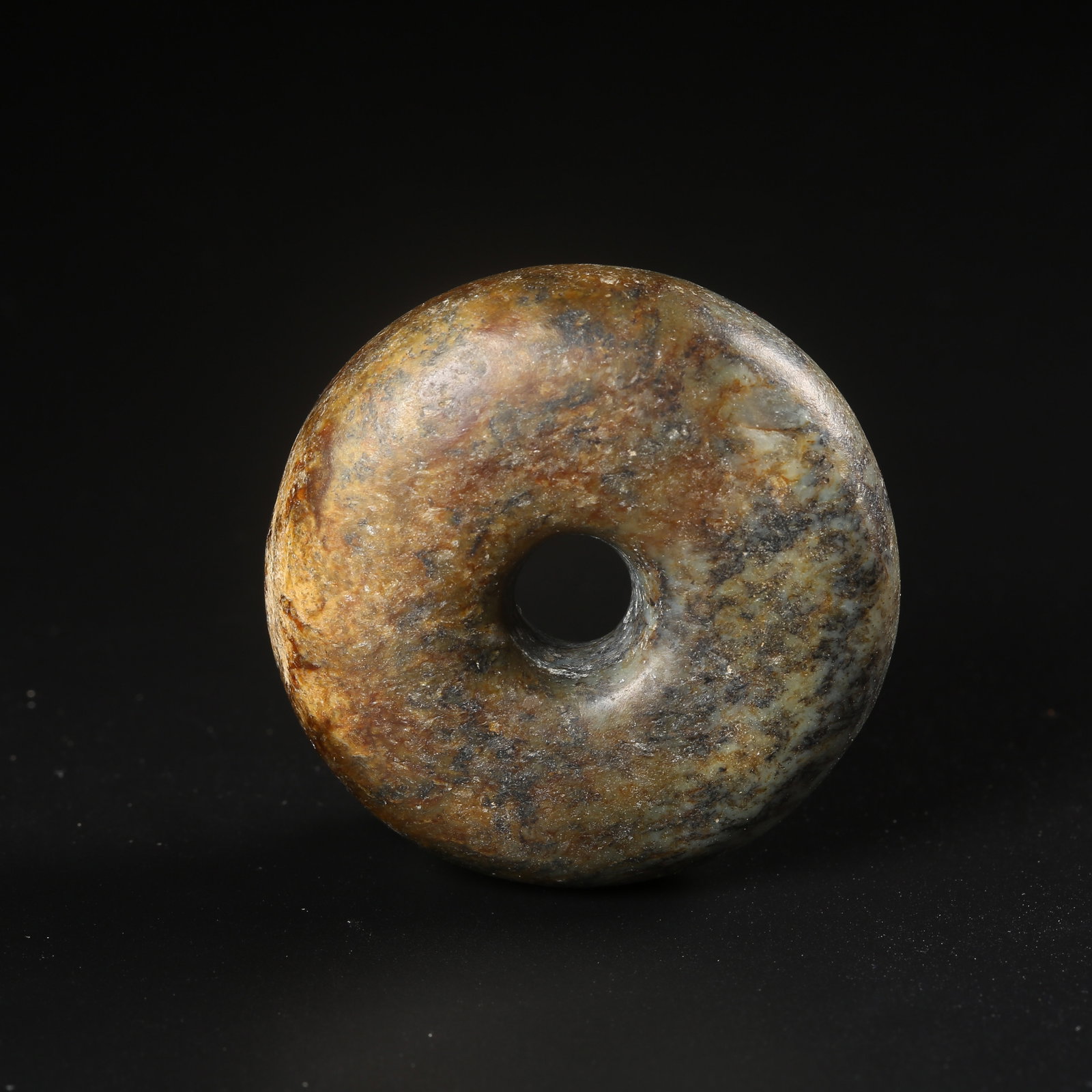 A ARCHAIC JADE BI-RING: Archaic jade bi-ring
