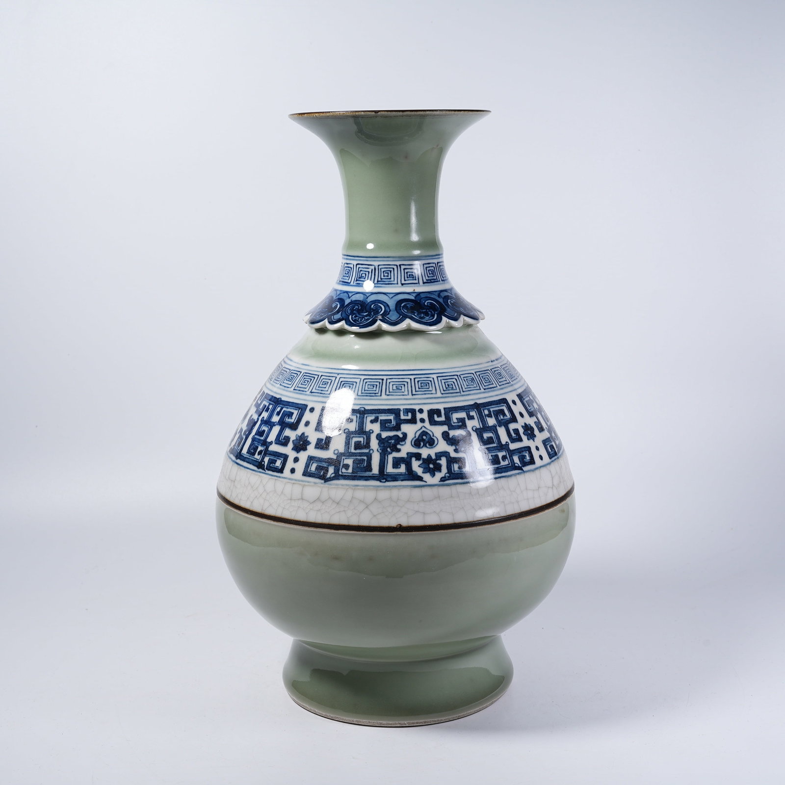 A PEAR-SHAPED VASE WITH LIGHT CELADON BASE AND BLUE AND WHITE KUI DRAGON PATTERN: Pear-shaped Vase with Light Celadon Base and Blue and White Kui Dragon Pattern