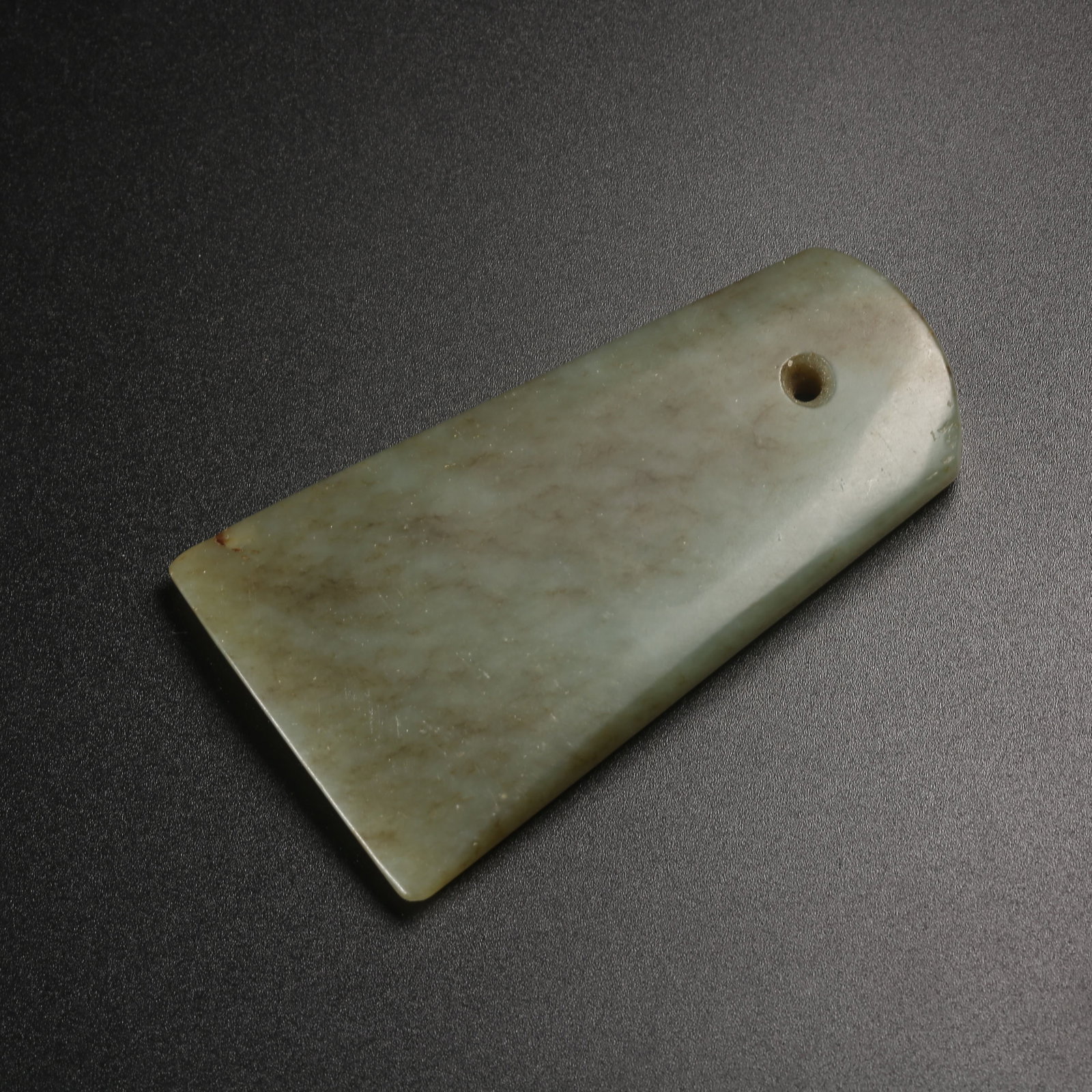 A ARCHAIC JADE AXE (1 of 9)