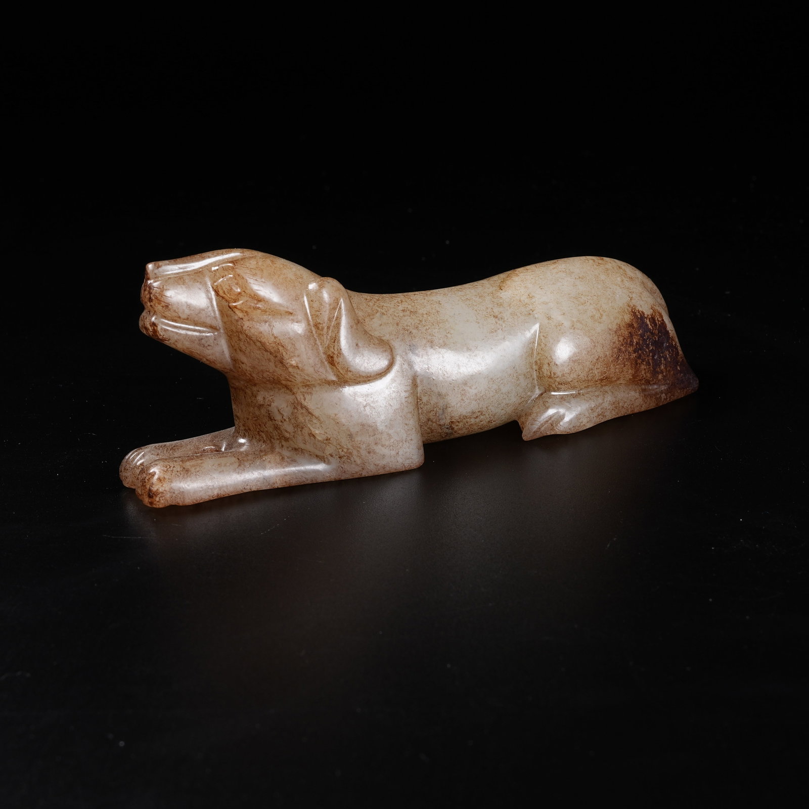 A ANCIENT JADE RECUMBENT DOG ORNAMENT: Ancient Jade Recumbent Dog Ornament