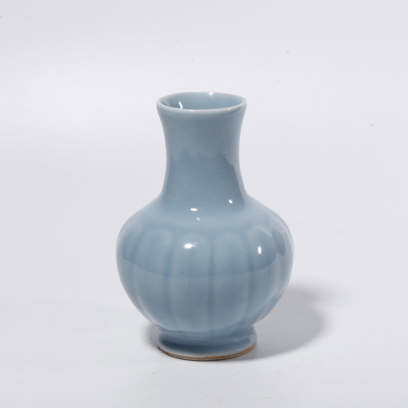 A SKY BLUE GLAZE FLOWER HOLDER (1 of 9)