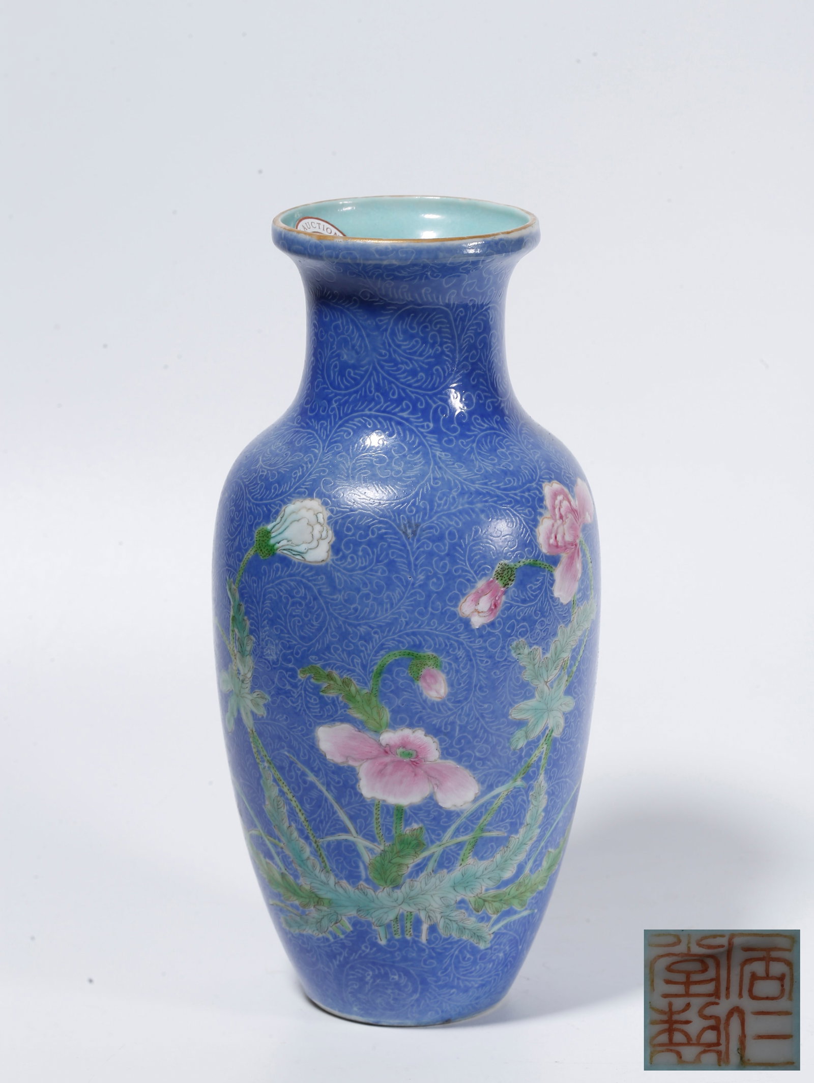 A BLUE GROUND INCISED FAMILLE ROSE DISPLAY VASE WITH FLORAL PATTERNS: Blue Ground Incised Famille Rose Display Vase with Floral Patterns
