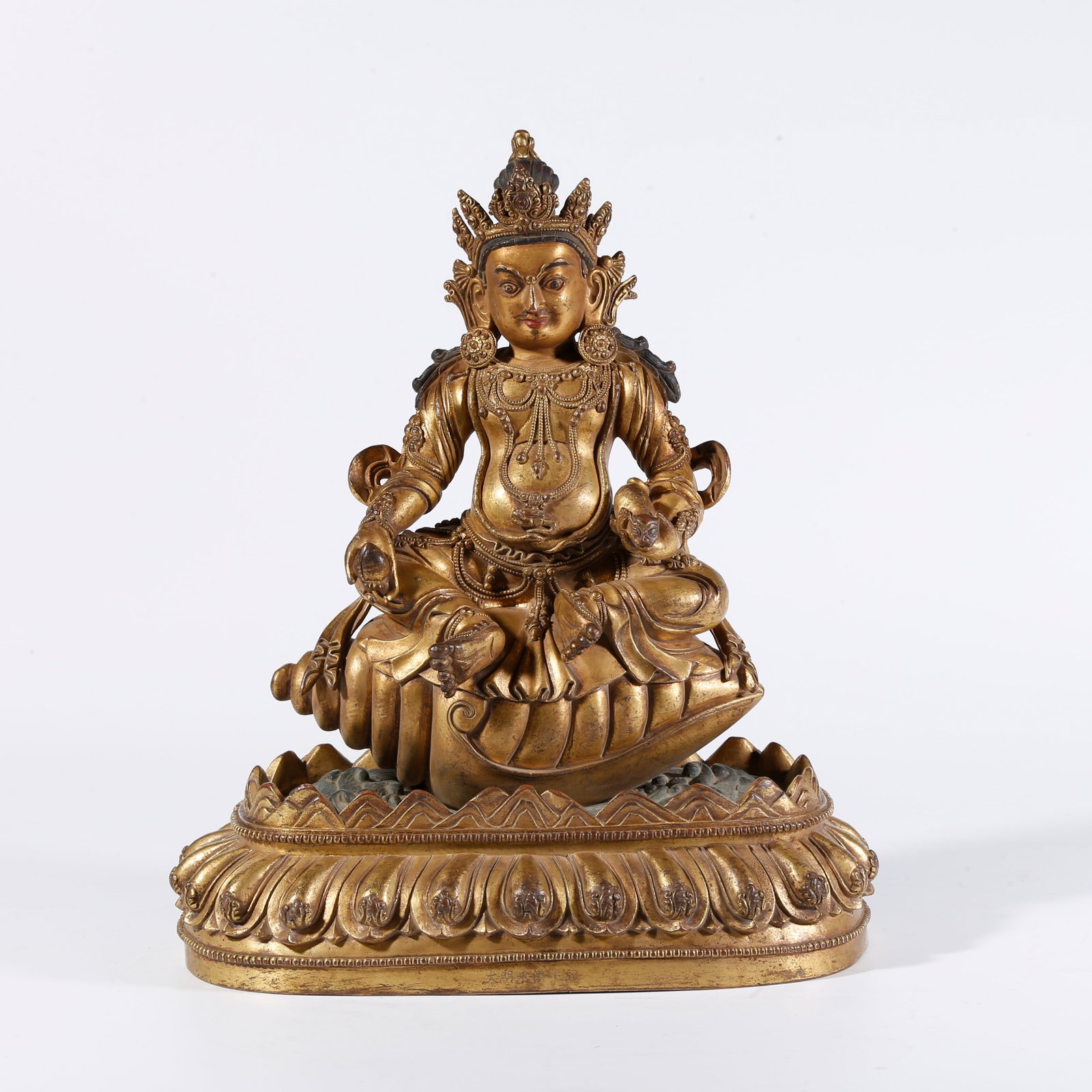 A GILT BRONZE STATUE OF THE GOD OF WEALTH: Gilt Bronze Statue of the God of Wealth