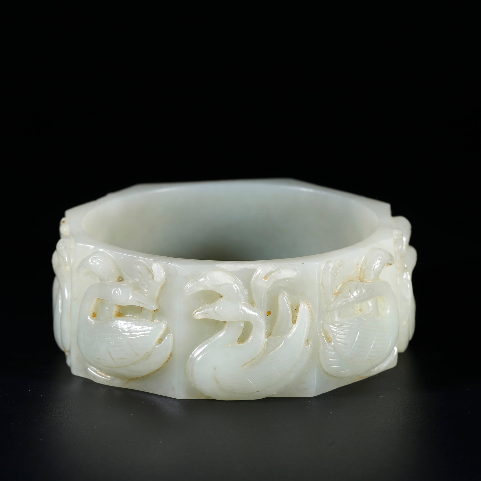 A ANCIENT JADE BRACELET CARVED WITH BEAST MOTIFS (1 of 8)