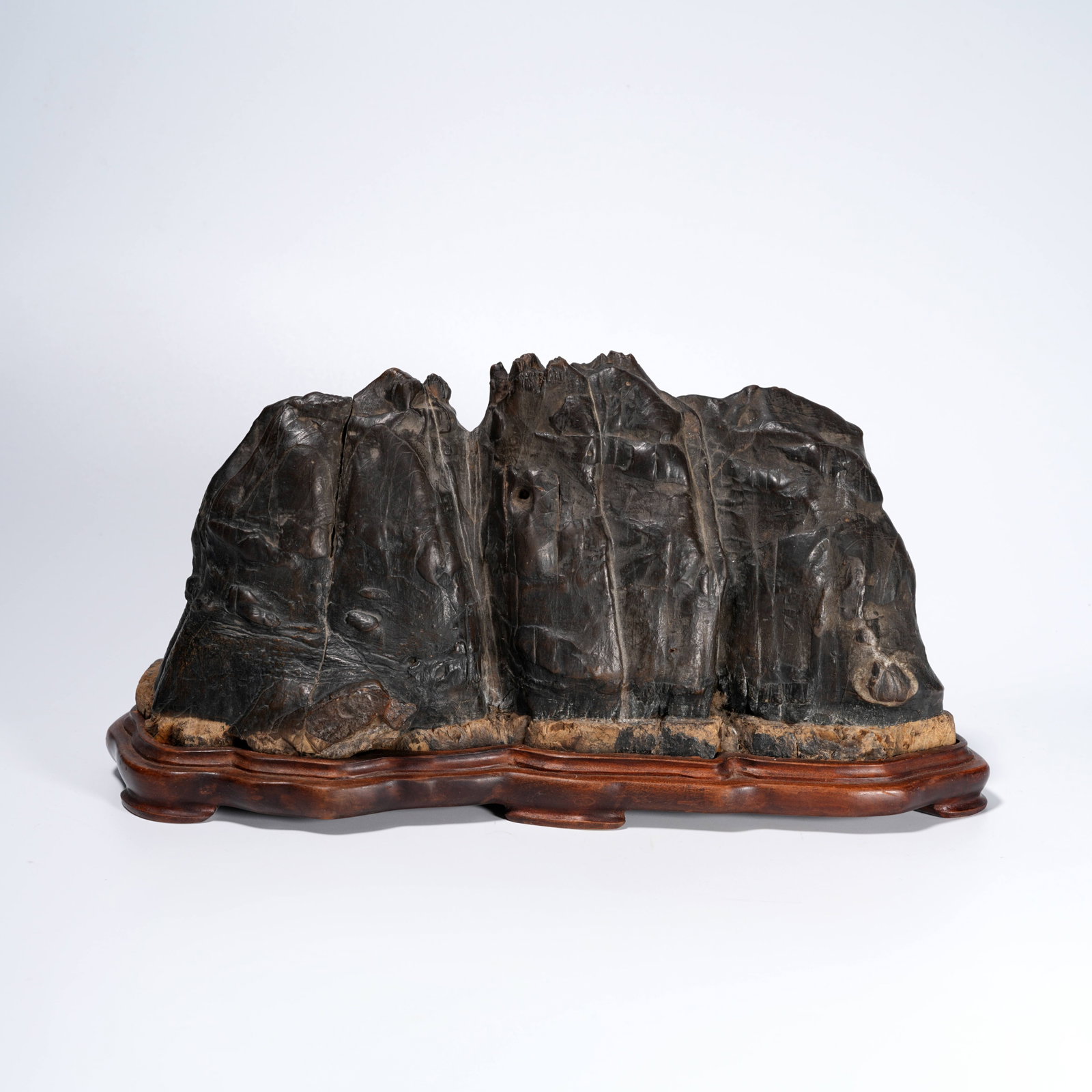 A STONE CARVED MOUNTAIN-FORM ORNAMENT: Stone Carved Mountain-Form Ornament