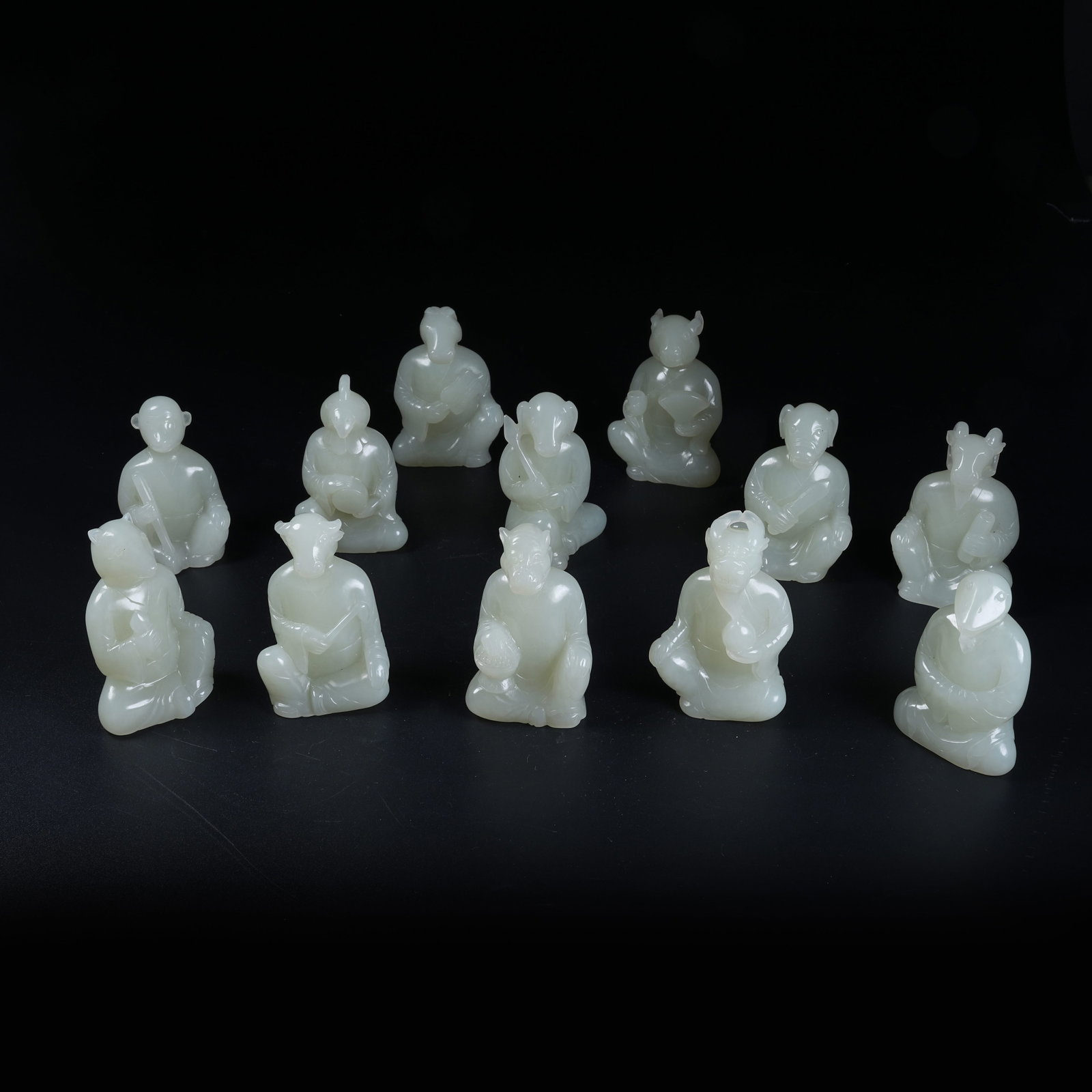 A SET OF TWELVE CHINESE ZODIAC ORNAMENTS OF HETIAN JADE (1 of 11)