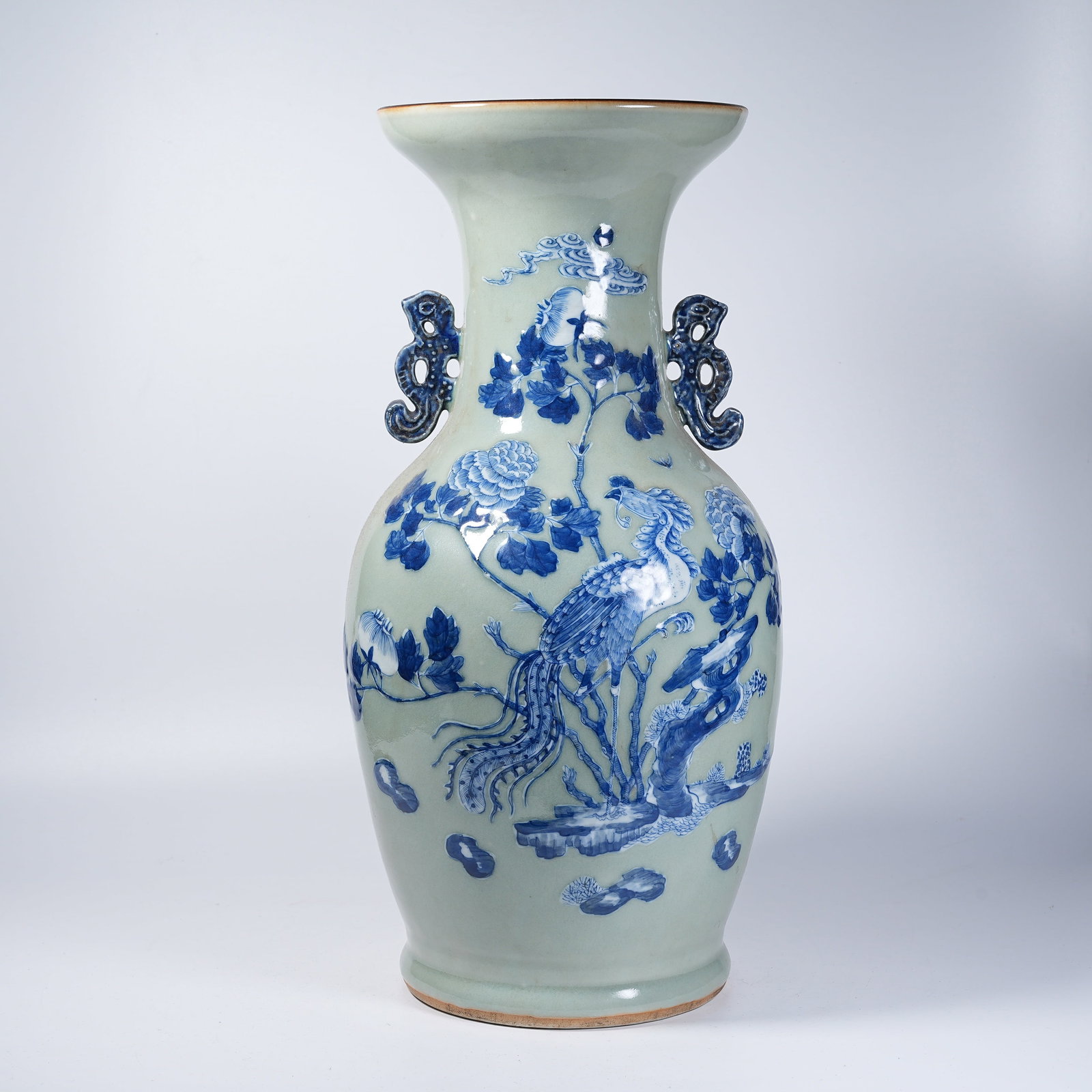 A BEAST-EAR DECORATIVE VASE WITH BLUE AND WHITE FLORAL AND PHOENIX PATTERN: Beast-ear Decorative Vase with Blue and White Floral and Phoenix Pattern