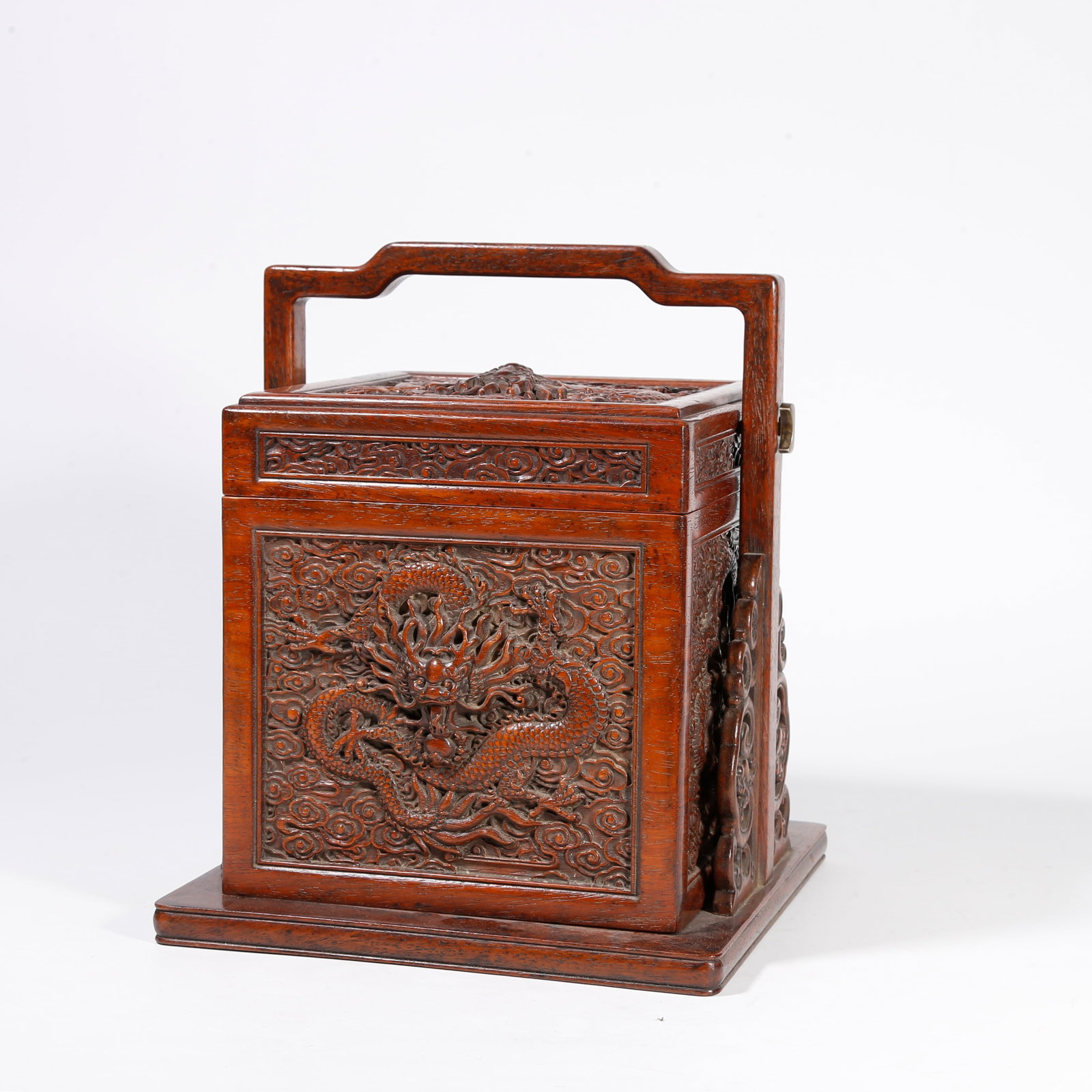 A HUANGHUALI WOOD COVERED BOX CARVED WITH DRAGON PATTERN: Huanghuali Wood Covered Box Carved with Dragon Pattern