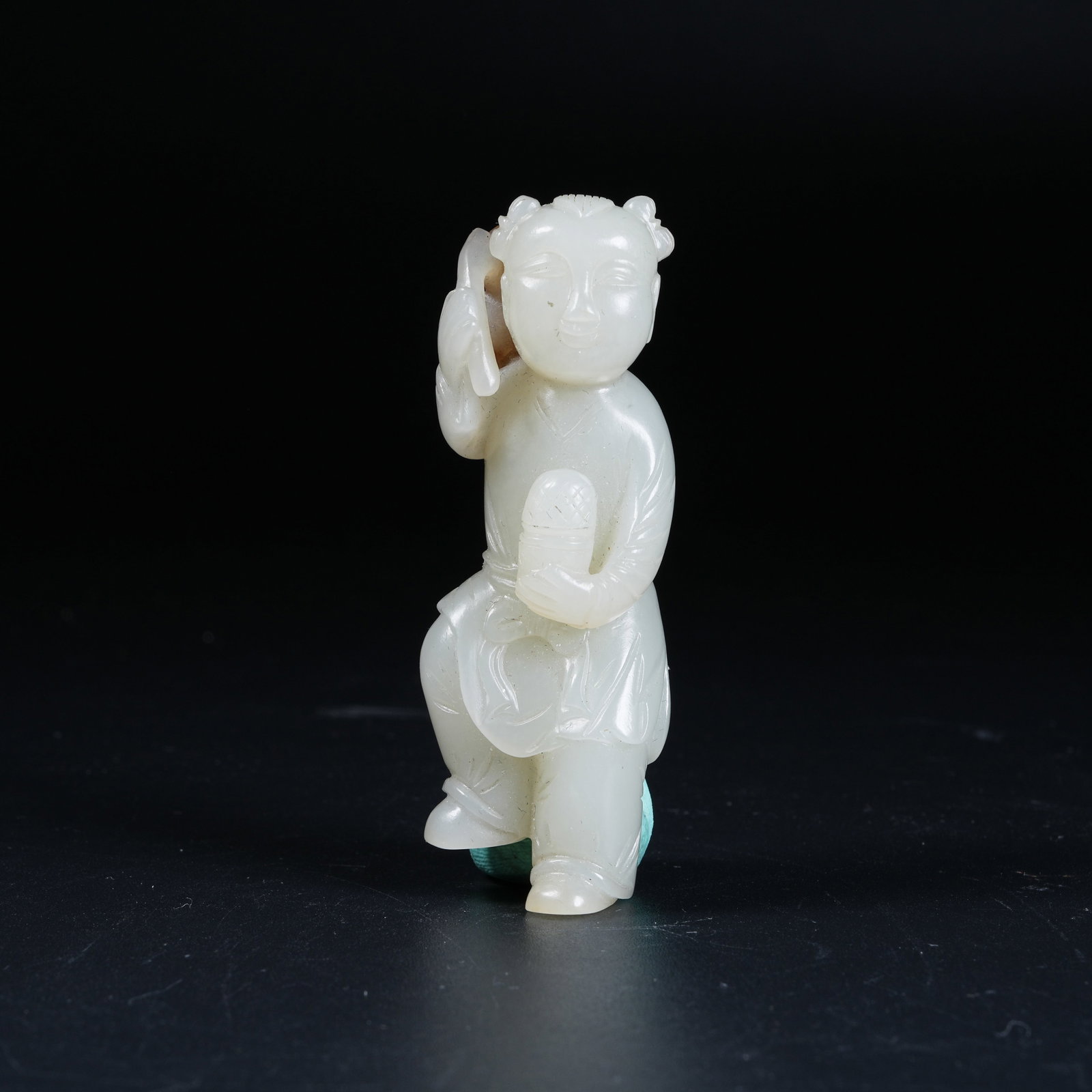 A HETIAN JADE HANGING ORNAMENT OF BOY WITH GANODERMA LUCIDUM: Hetian Jade Hanging Ornament of Boy with Ganoderma Lucidum