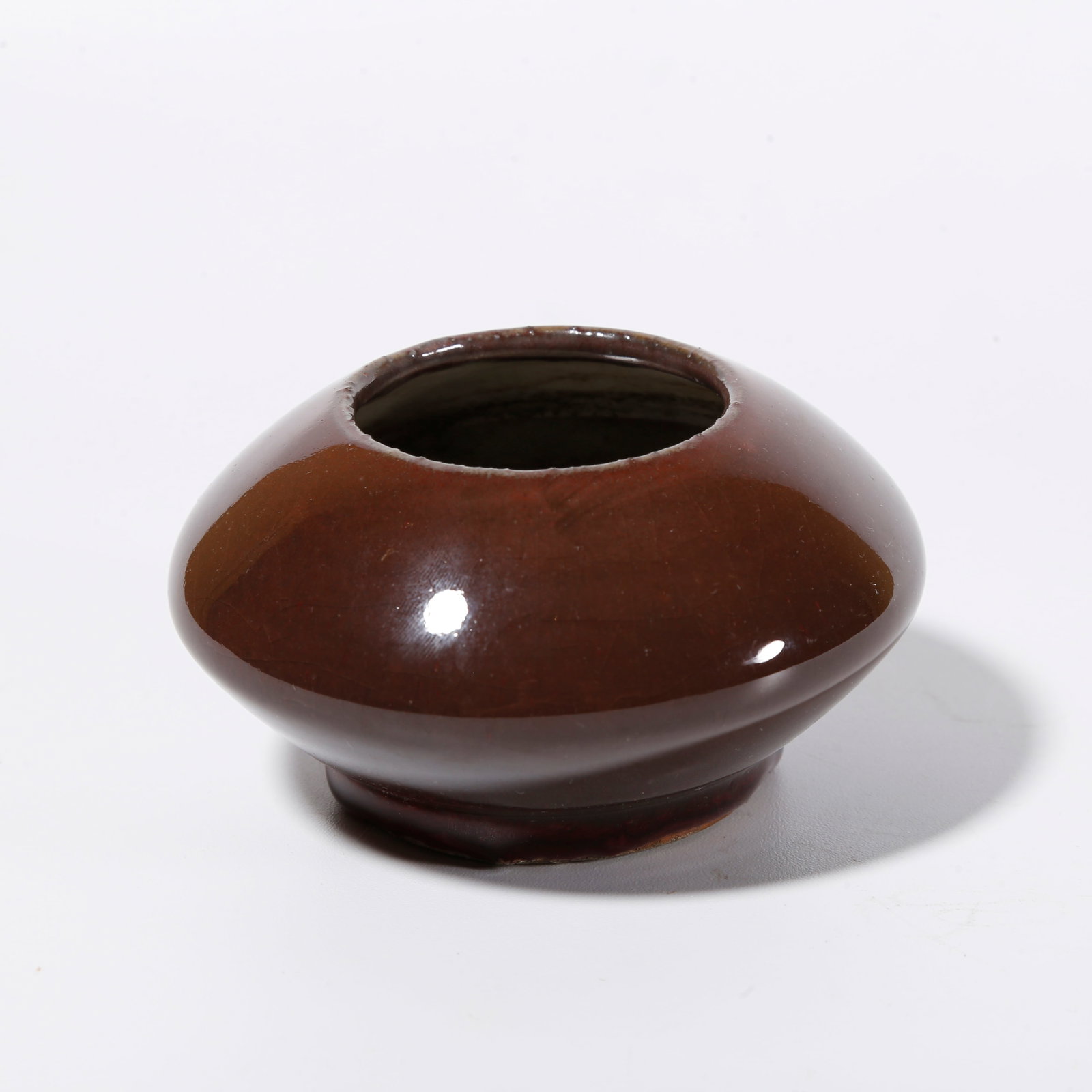 A RED GLAZE WATER WASHER: Red Glaze Water Washer
