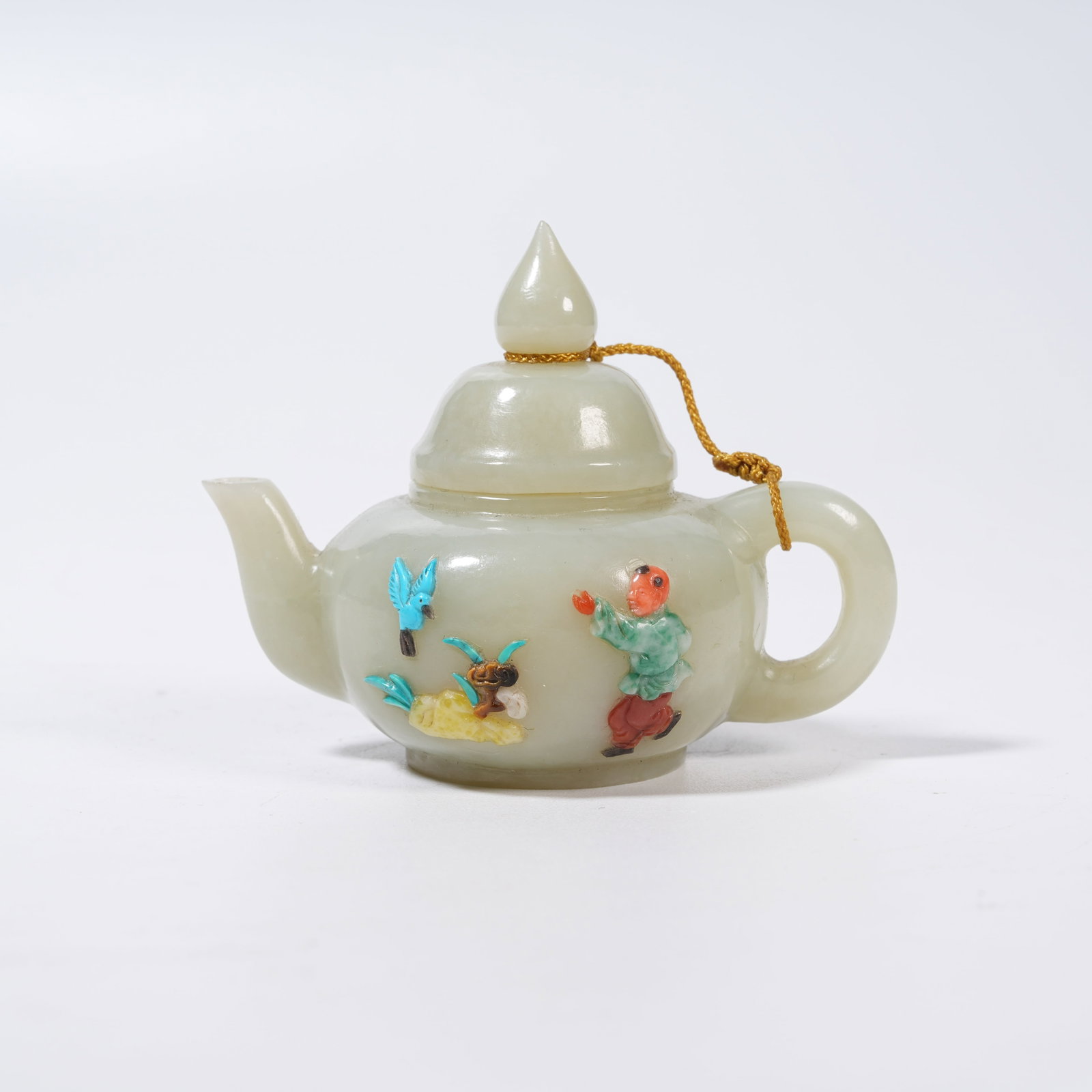 A HETIAN JADE EWER WITH CHILDREN AT PLAY MOTIFS AND PRECIOUS STONE INLAY: Hetian Jade Ewer with Children at Play Motifs and Precious Stone Inlay