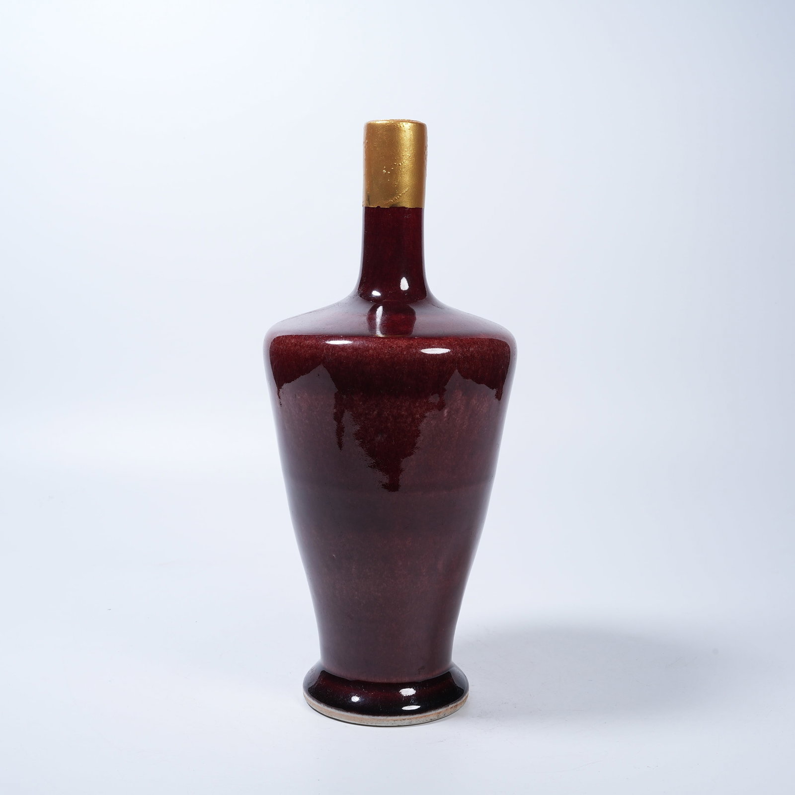 A LANGYAO RED GLAZE LONG-NECK VASE: Langyao Red Glaze Long-Neck Vase