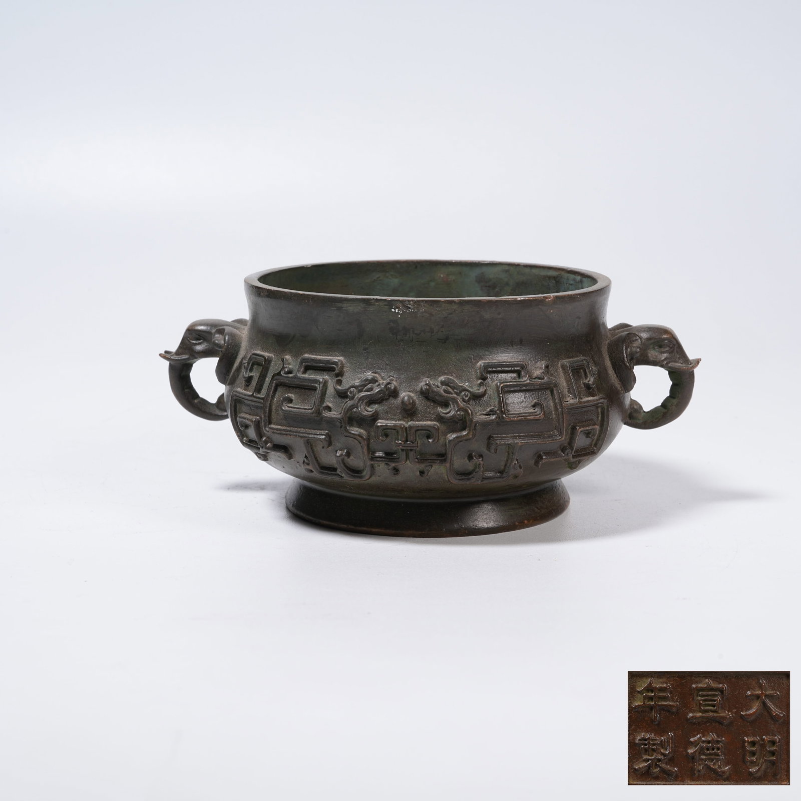 A BRONZE CENSER WITH DRAGON PATTERNS AND ELEPHANT EARS (1 of 8)