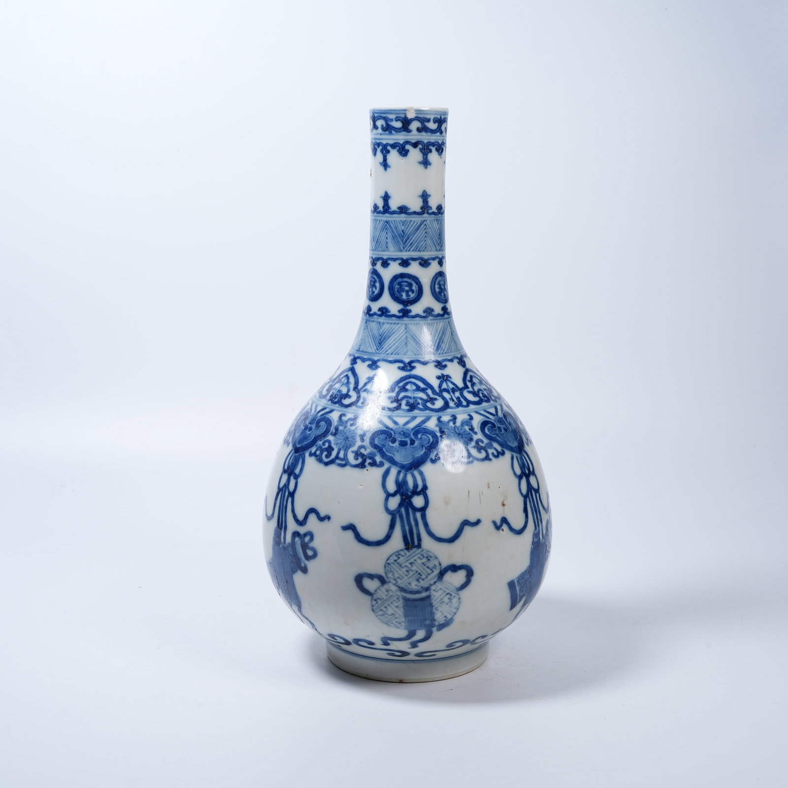 A BLUE AND WHITE LONG-NECK VASE WITH EIGHT TREASURES PATTERNS (1 of 9)