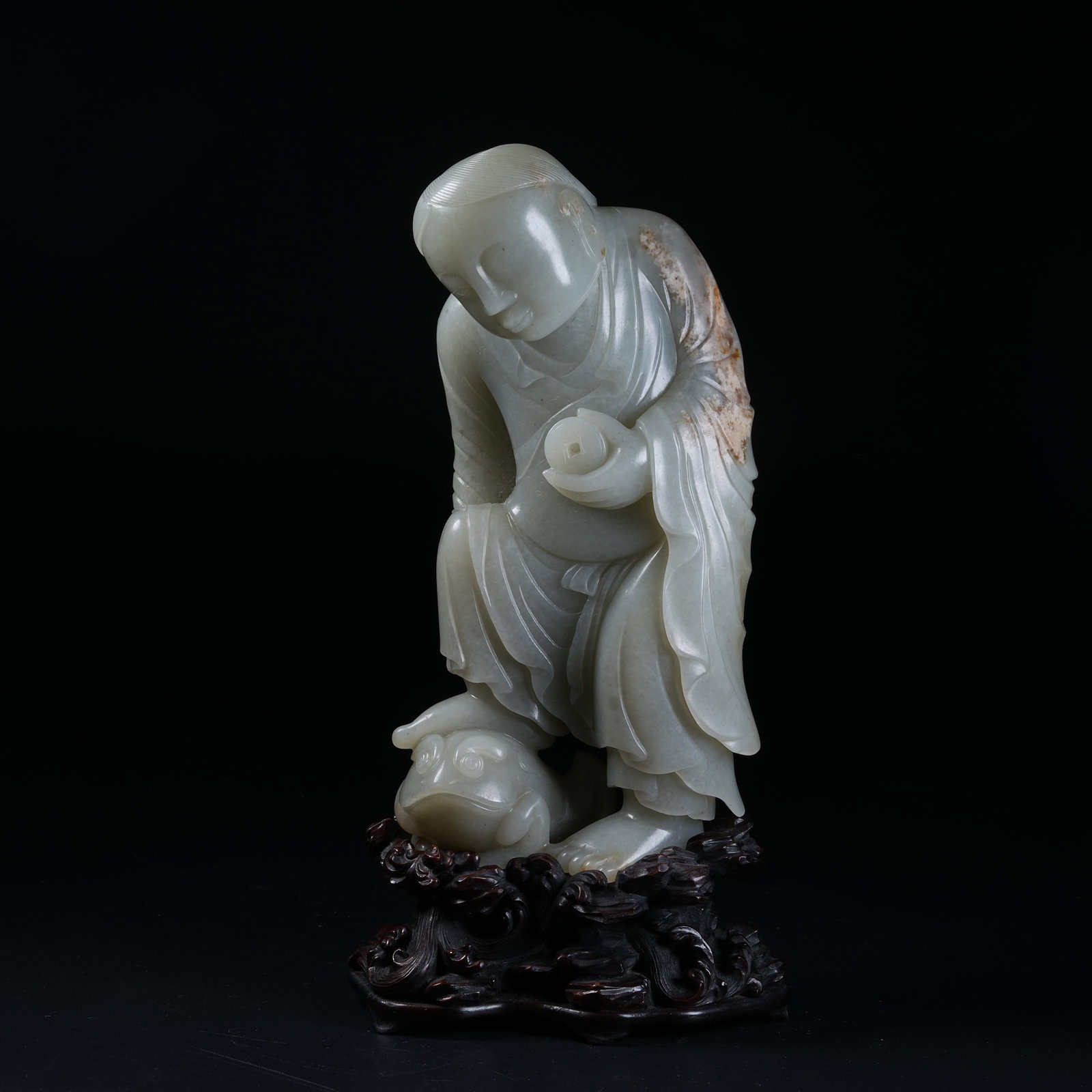 A STANDING STATUE OF LIU HAI TEASING GOLDEN TOAD OF HETIAN JADE: Standing Statue of Liu Hai Teasing Golden Toad of Hetian Jade