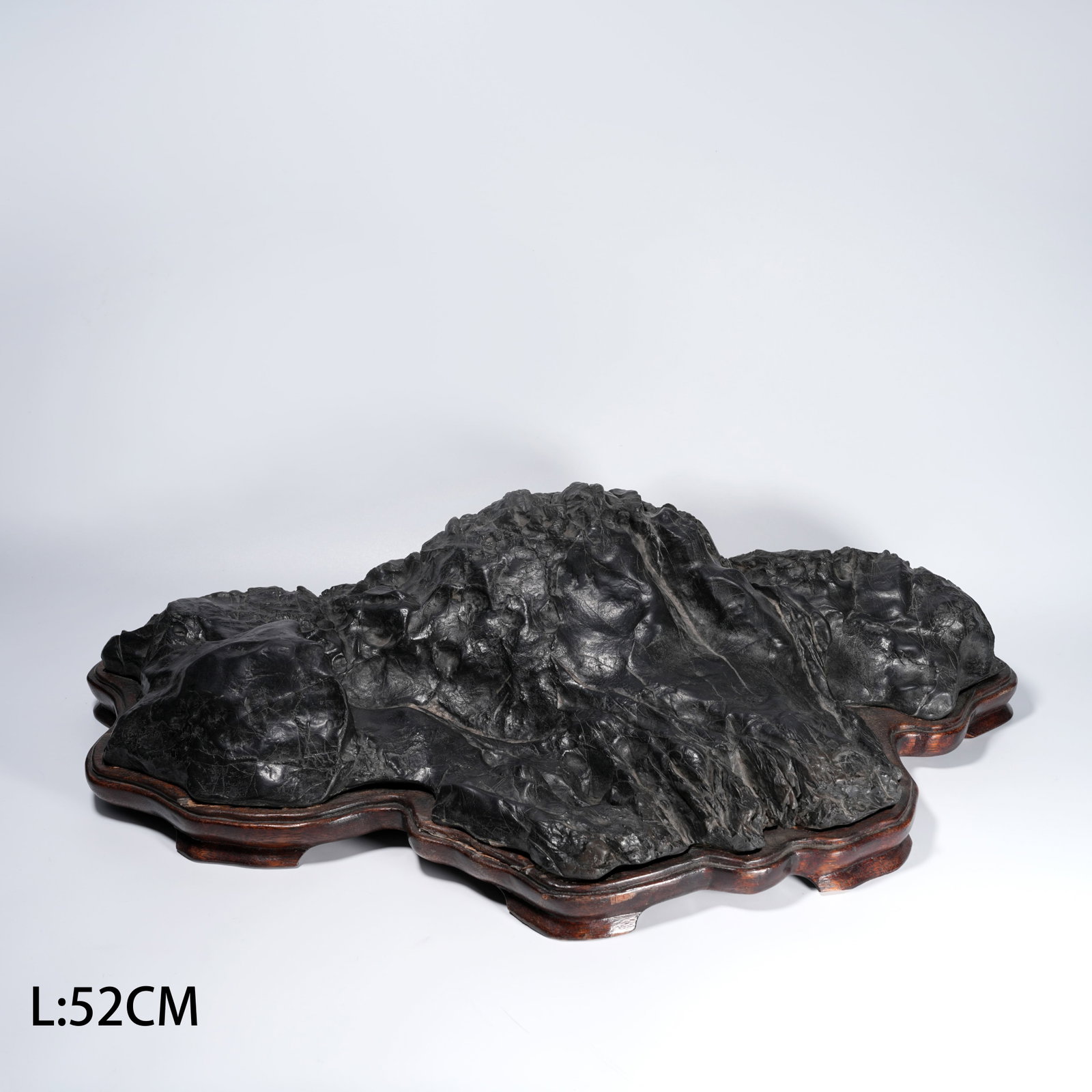A STONE CARVED MOUNTAIN-FORM ORNAMENT: Stone Carved Mountain-Form Ornament