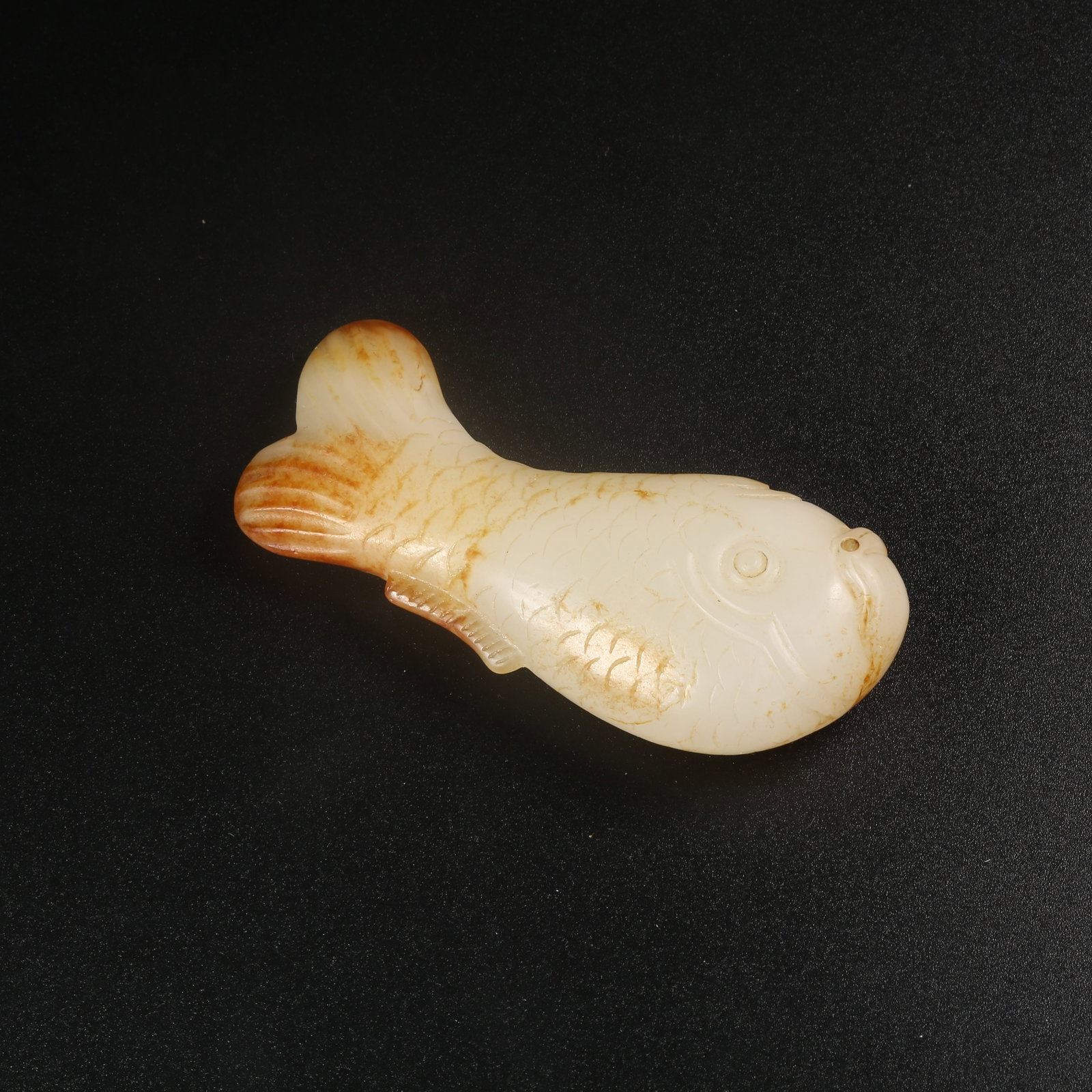 A ARCHAIC JADE FISH PENDANT: Archaic jade fish pendant