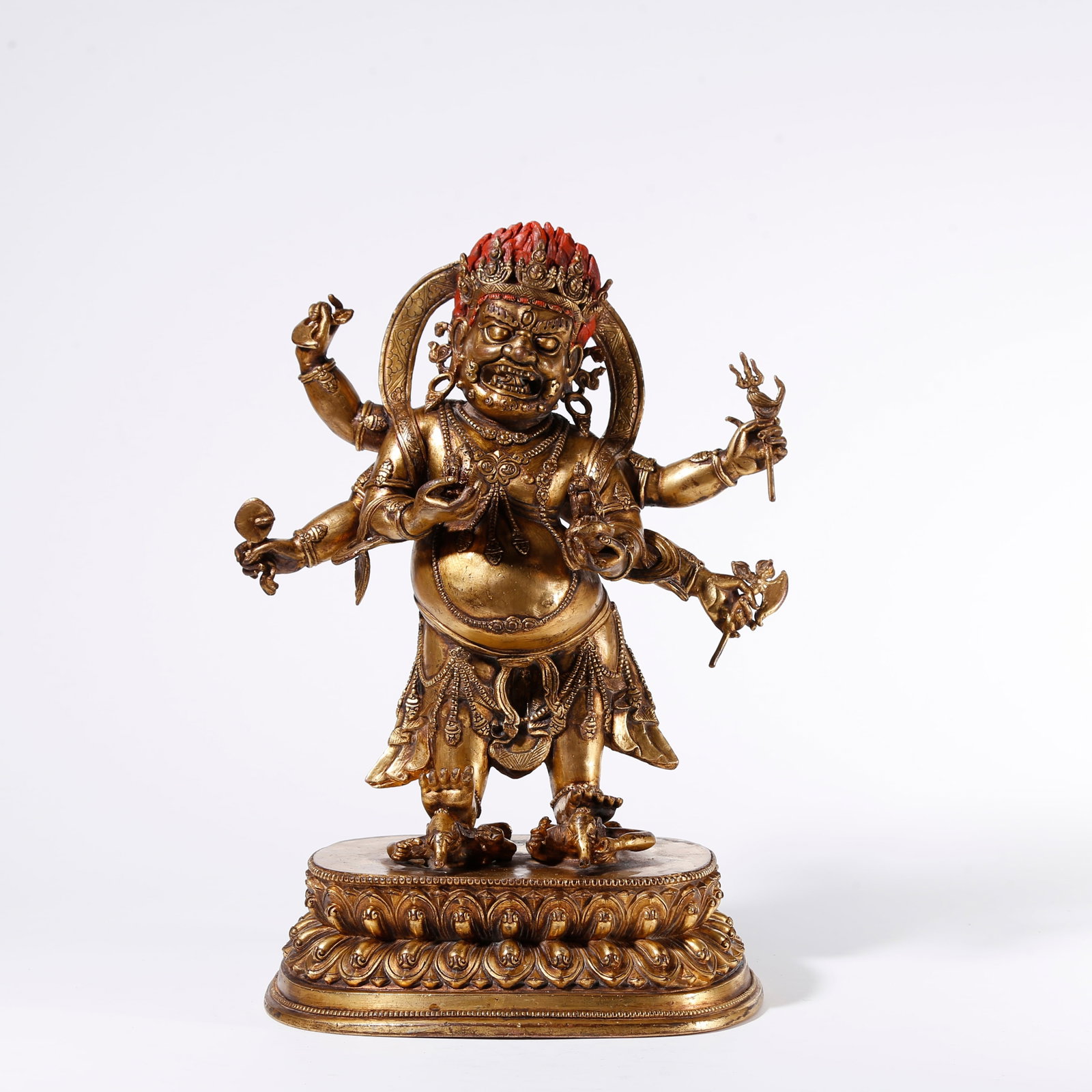 A GILT BRONZE STATUE OF SIX-ARMED MAHAKALA (1 of 9)