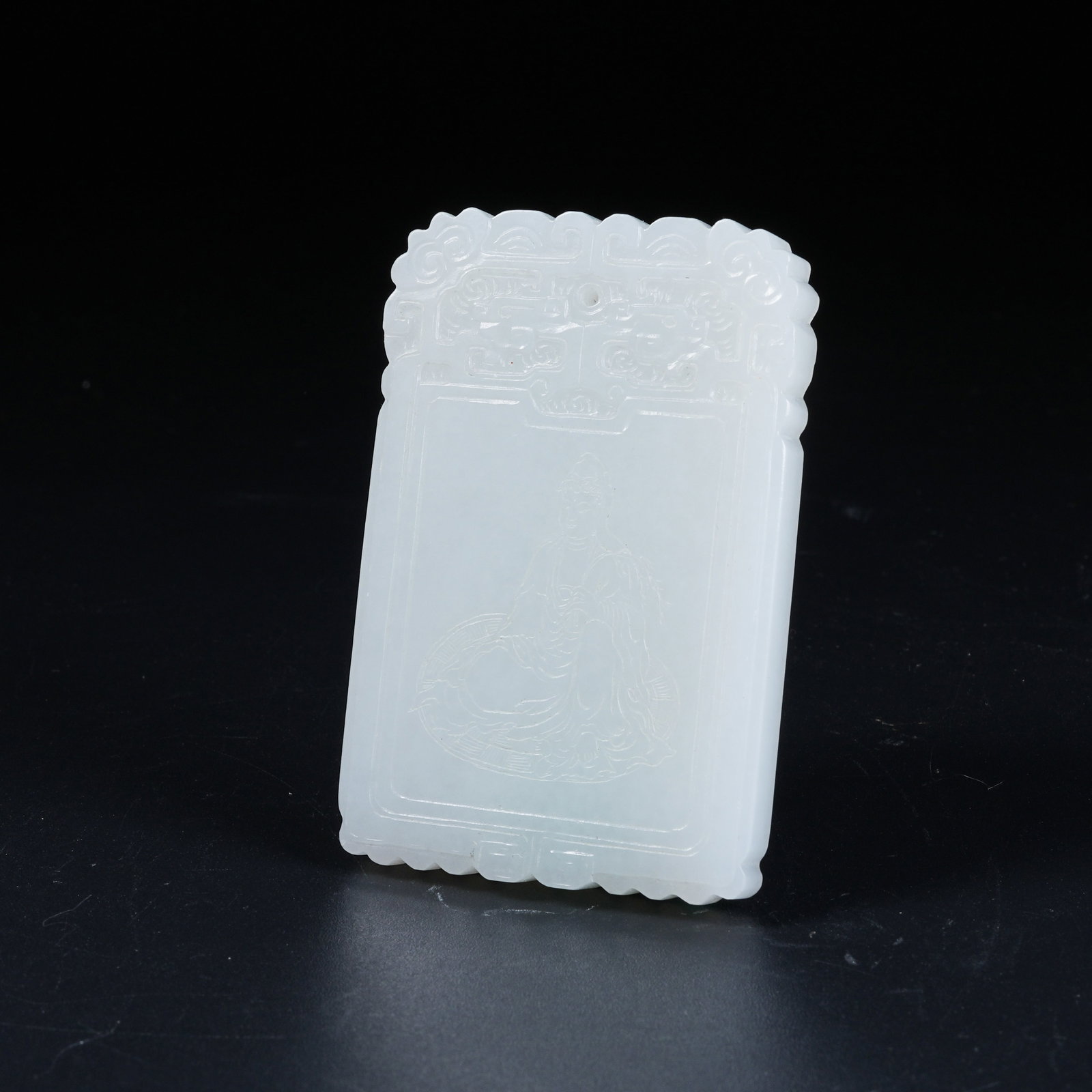 A HETIAN WHITE JADE PENDANT CARVED WITH GUANYIN PATTERN: Hetian White Jade Pendant Carved with Guanyin Pattern