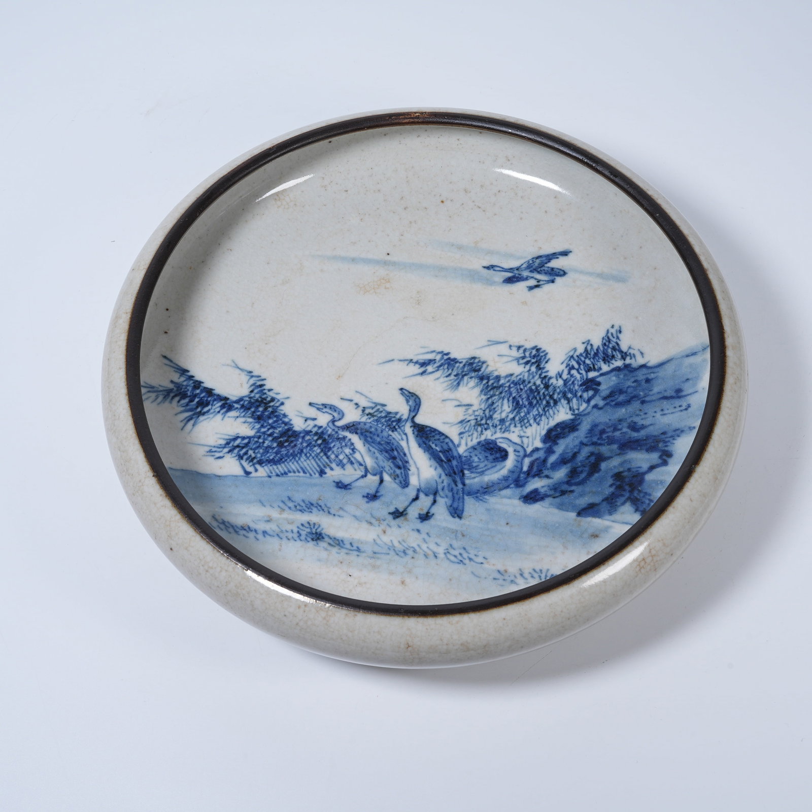 A BLUE AND WHITE BRUSH WASHER WITH FLOWER AND BIRD MOTIFS: Blue and White Brush Washer with Flower and Bird Motifs