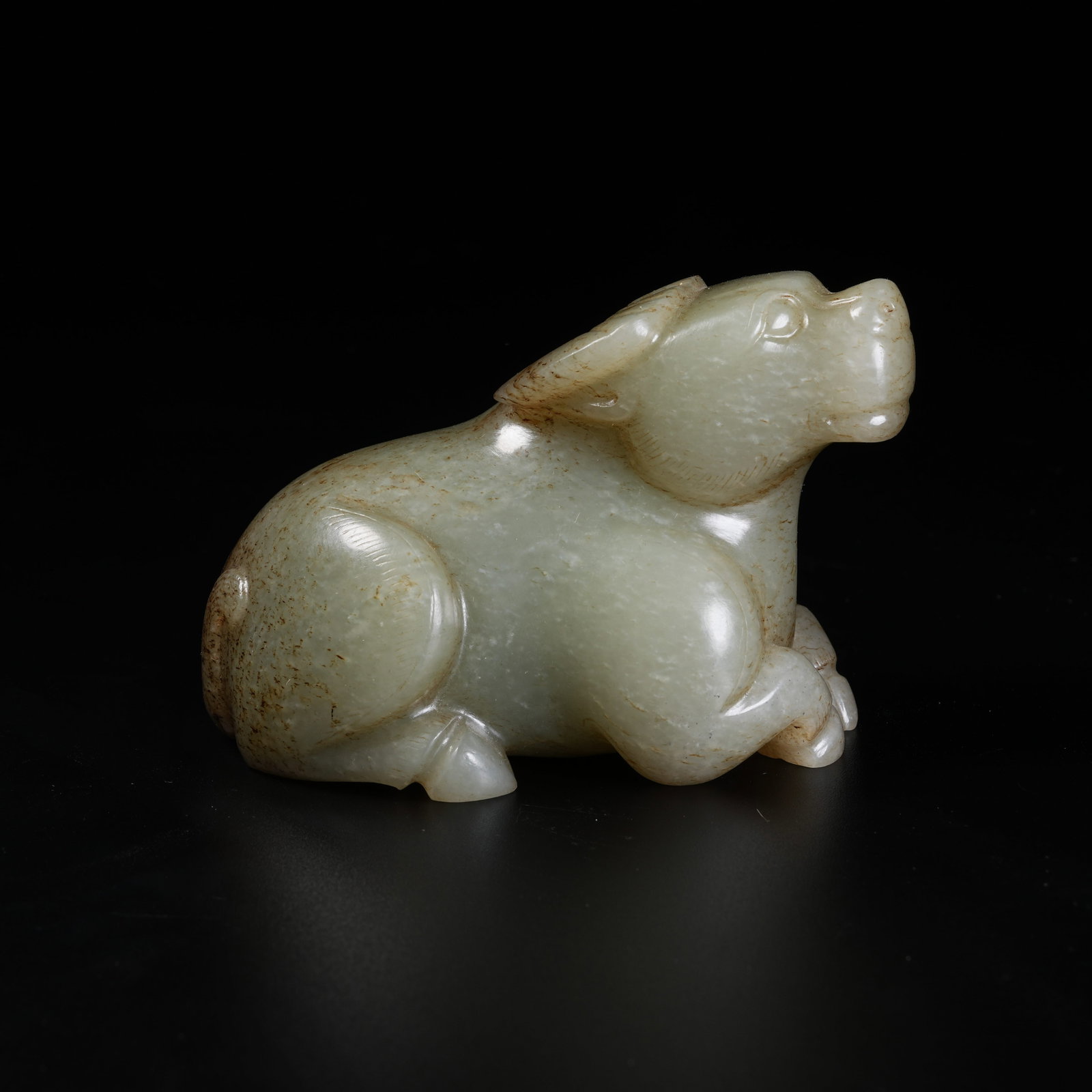 A ANCIENT JADE RECUMBENT OX ORNAMENT (1 of 8)