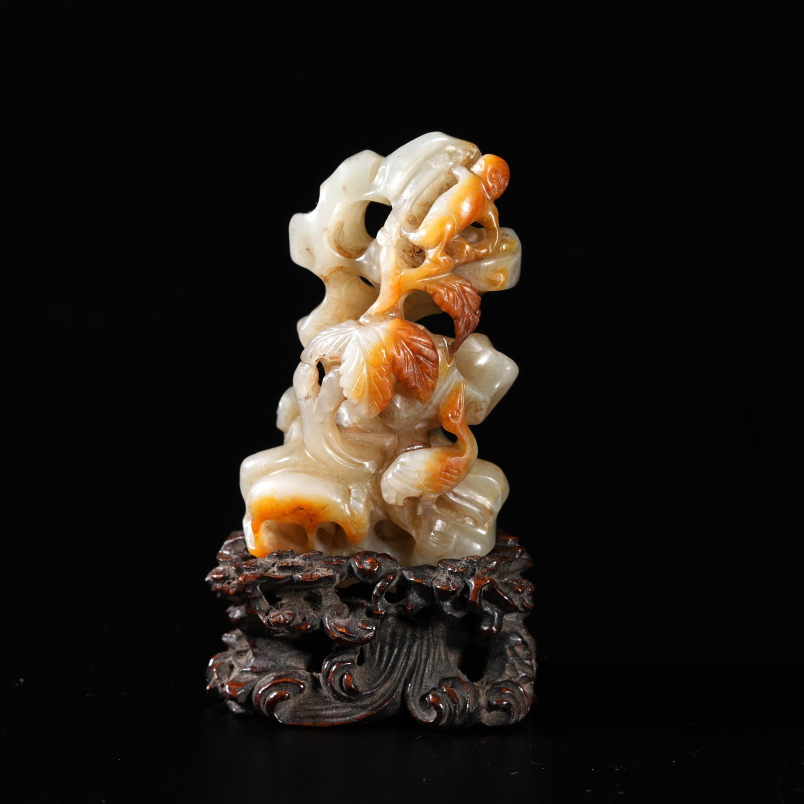 A HETIAN JADE CARVED MOUNTAIN-FORM ORNAMENT: Hetian Jade Carved Mountain-Form Ornament