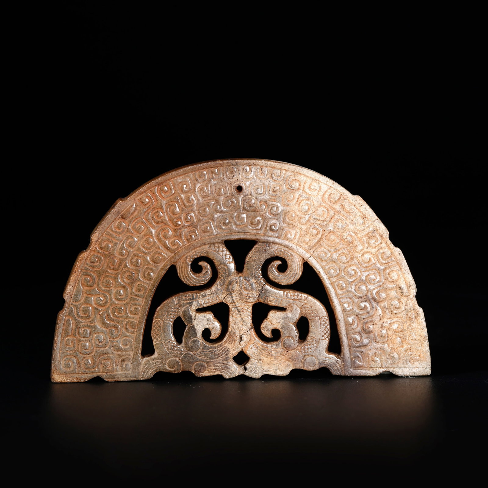 A ANCIENT JADE PENDANT CARVED WITH BEAST MOTIFS: Ancient Jade Pendant Carved with Beast Motifs