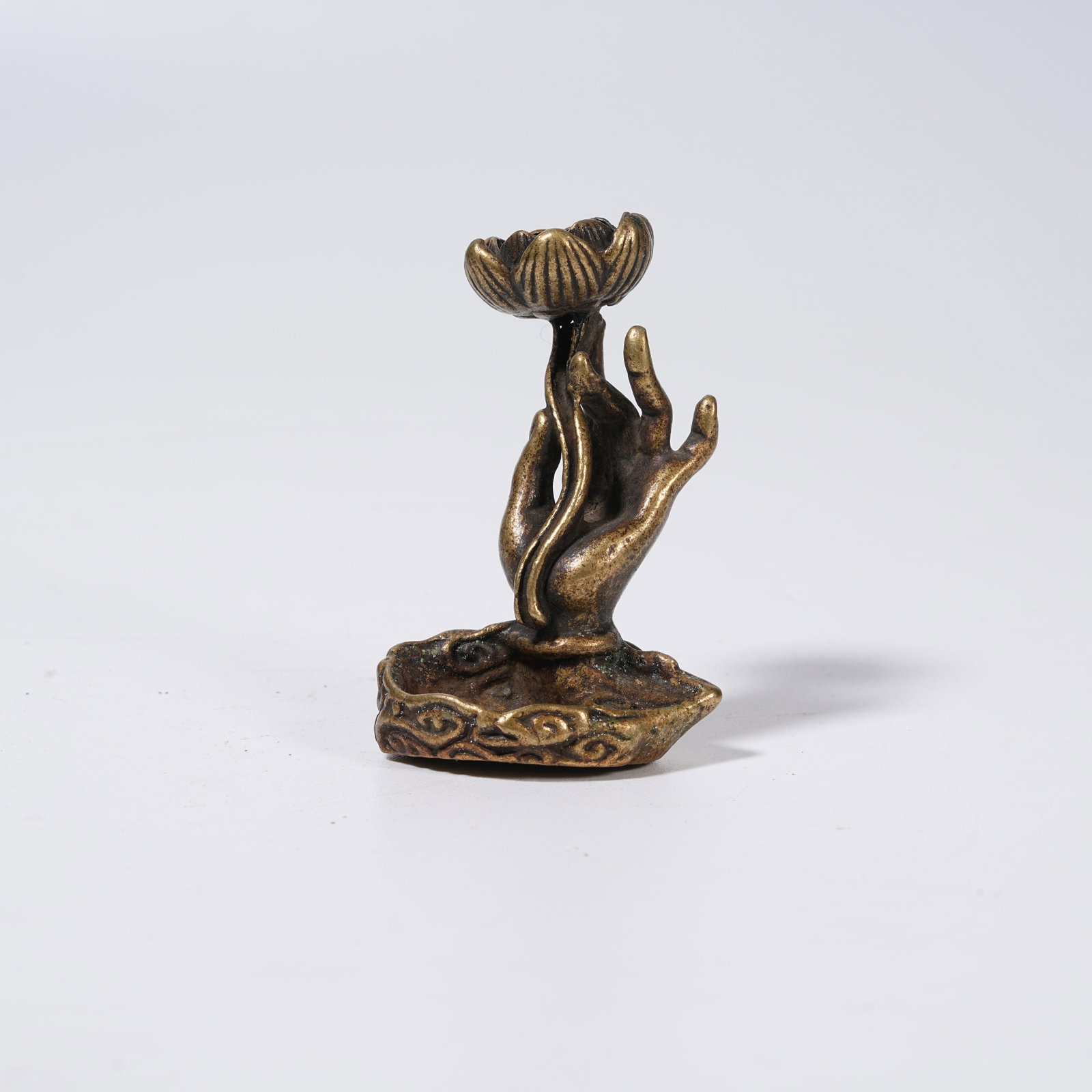 A BRONZE INCENSE HOLDER WITH LOTUS MOTIFS (1 of 8)