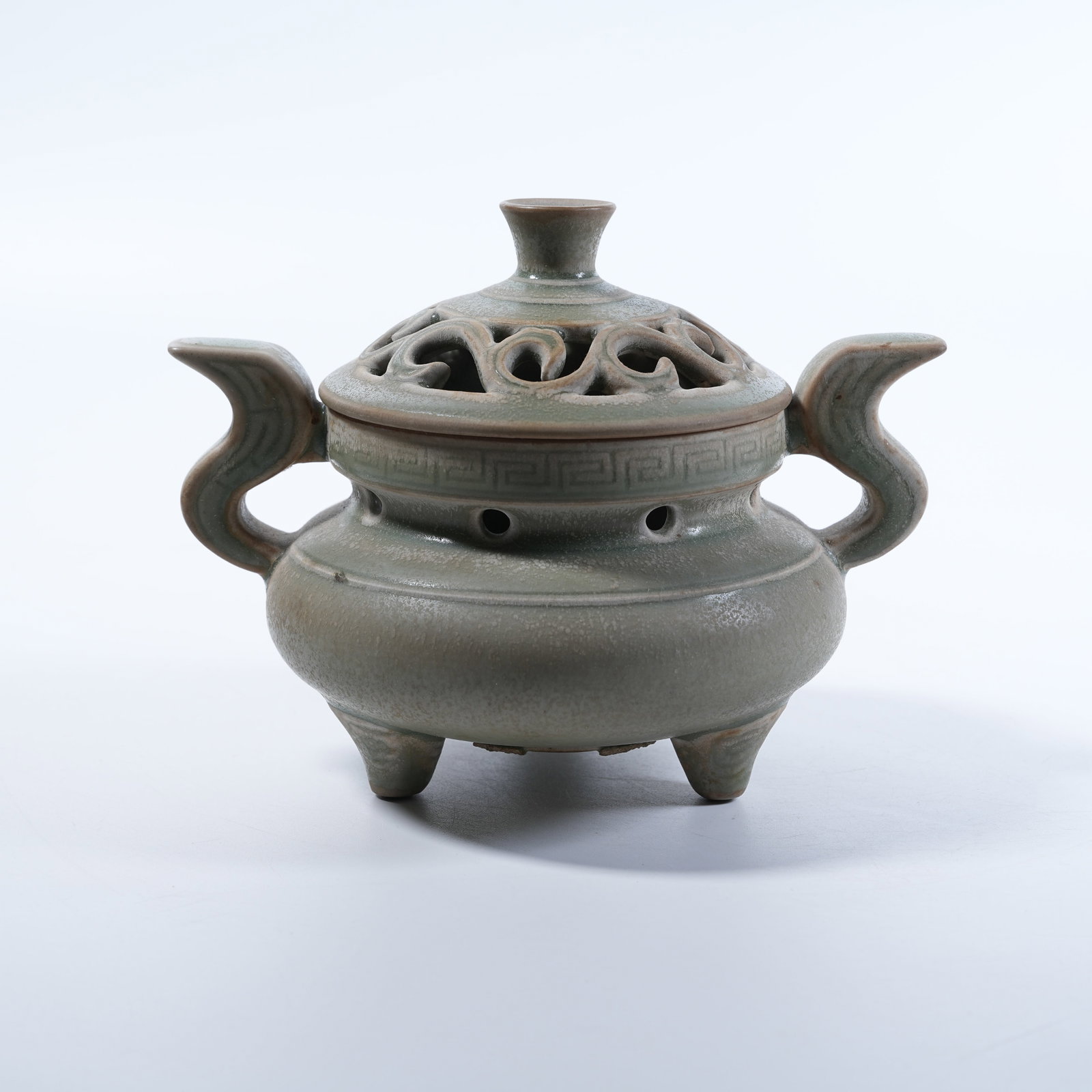 A TWO-EARED INCENSE BURNER OF YUE KILN: Two-Eared Incense Burner of Yue Kiln