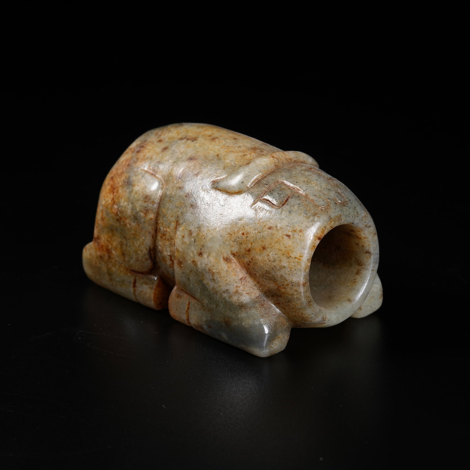 A ANCIENT JADE RECUMBENT OX ORNAMENT (1 of 8)