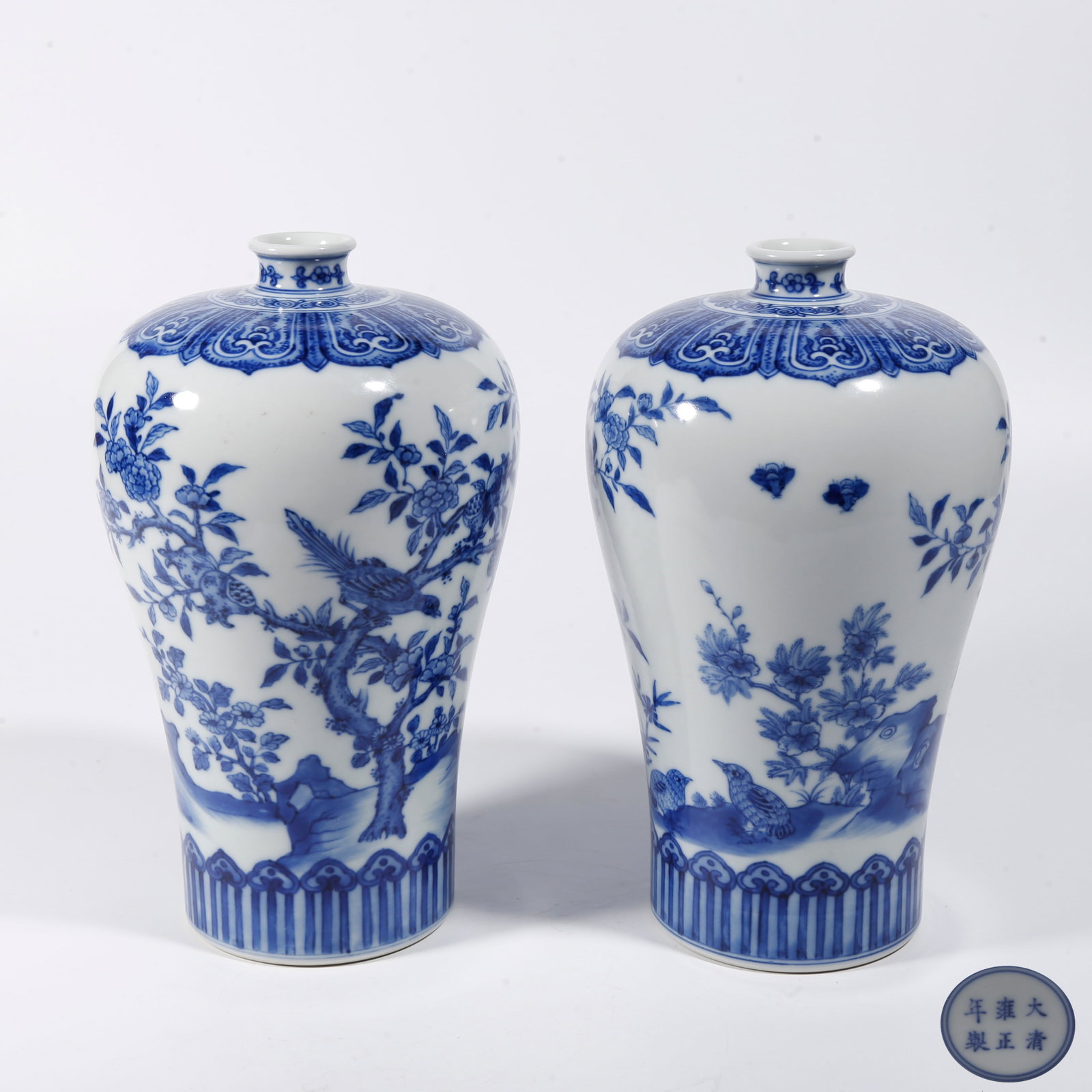 A BLUE AND WHITE PLUM VASE WITH FLOWER AND BIRD PATTERNS (A PAIR): Blue and White Plum Vase with Flower and Bird Patterns (A Pair)