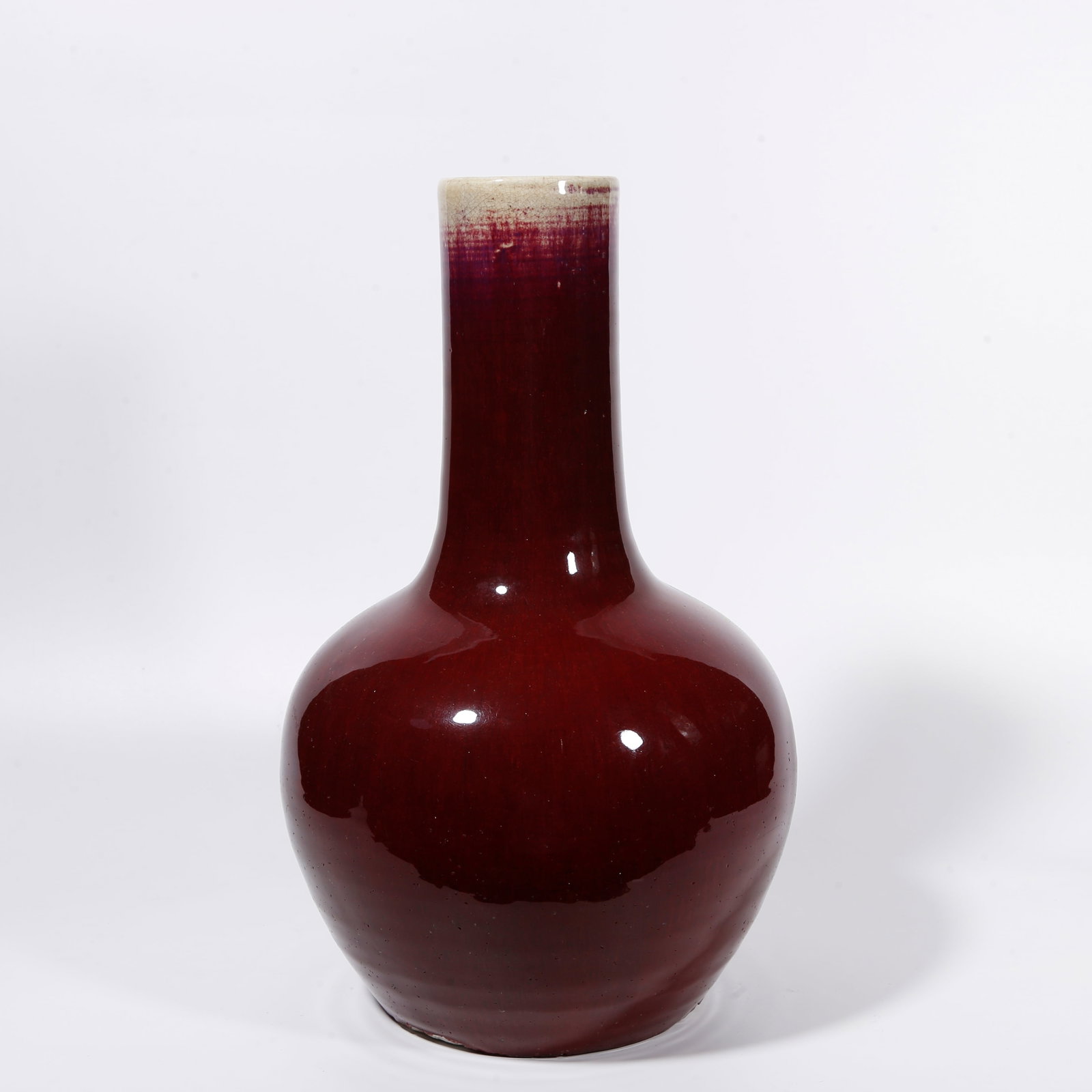 A FLAMBE GLAZE GLOBULAR VASE: Flambe Glaze Globular Vase