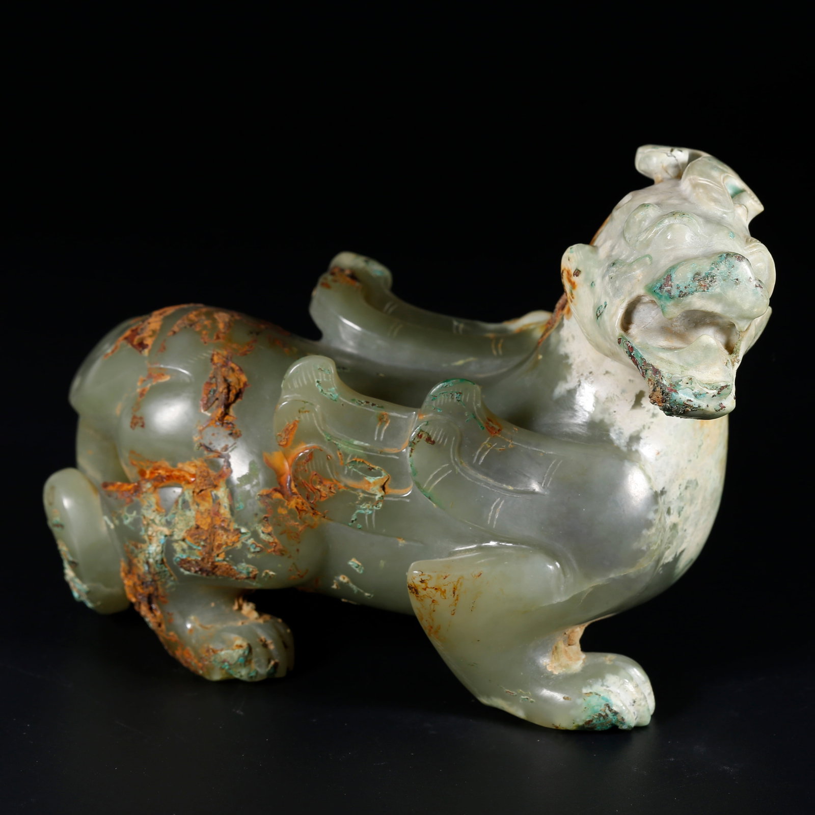A ARCHAIC JADE BEAST ORNAMENT: Archaic Jade Beast Ornament