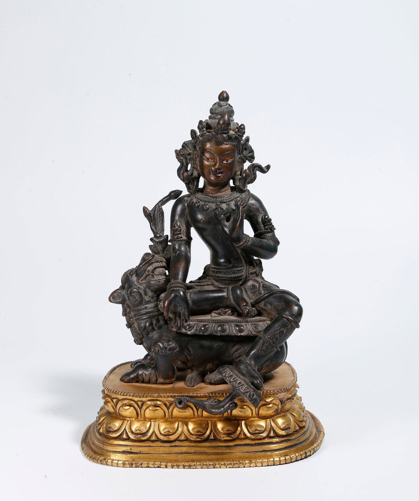 A GILT BRONZE GURU STATUE (1 of 9)