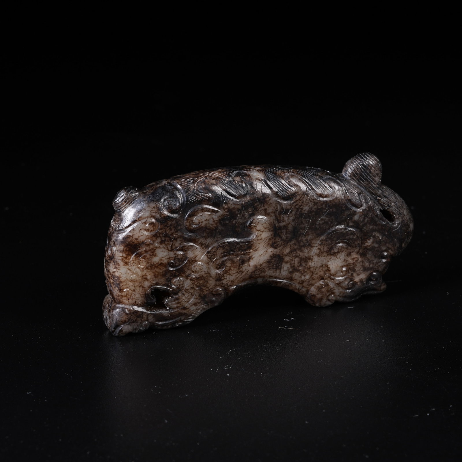 A ANCIENT JADE TIGER TALLY: Ancient Jade Tiger Tally