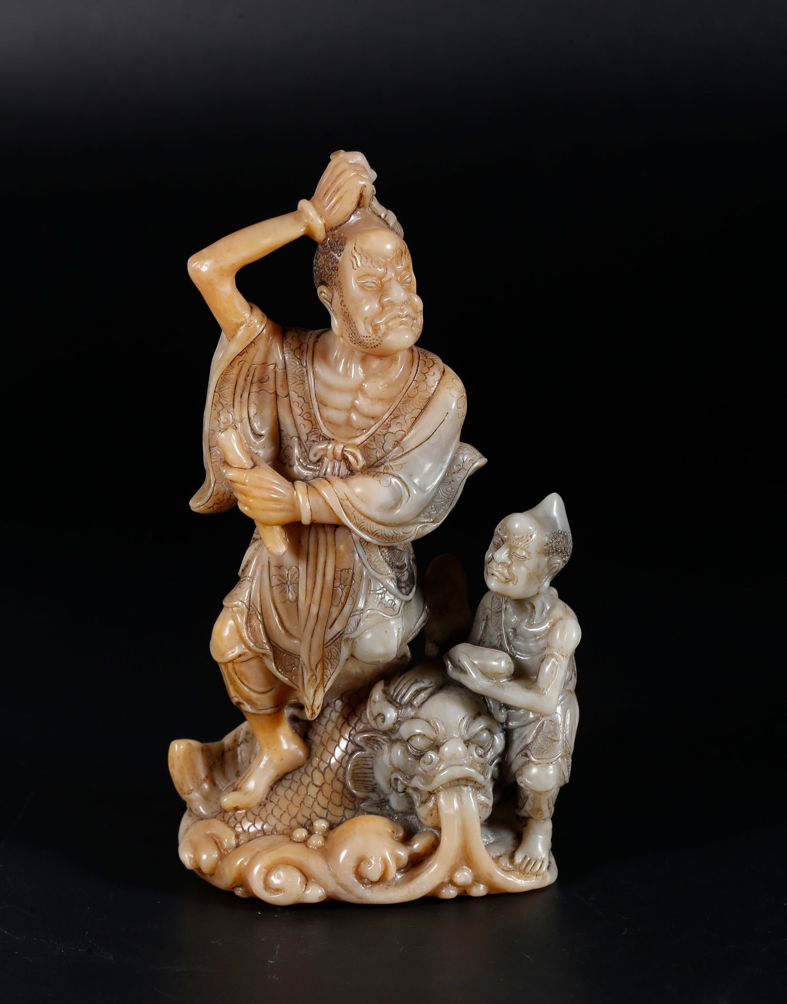 A SHOUSHAN STONE ORNAMENT OF KUIXING HOLDING WRITING BRUSH: Shoushan Stone Ornament of Kuixing Holding Writing Brush