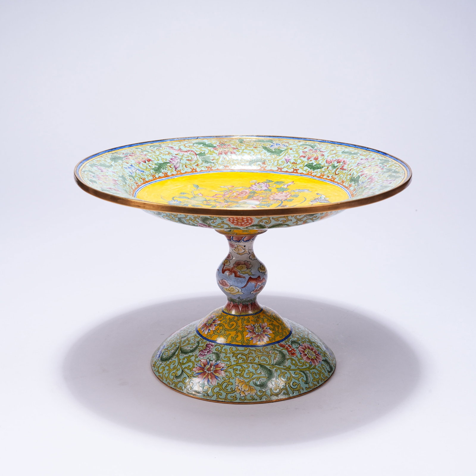 A CLOISONNÉ ENAMEL HIGH-FOOT PLATE WITH FLOWER, BUTTERFLY AND AUSPICIOUS FRUIT PATTERN: Cloisonné Enamel High-foot Plate with Flower, Butterfly and Auspicious Fruit Pattern