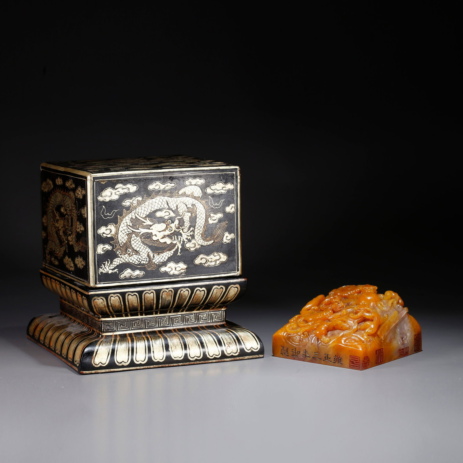 A SEAL CARVED WITH THREE-DRAGON PATTERN FROM SHOUSHAN TIANHUANG STONE: Seal Carved with Three-Dragon Pattern from Shoushan Tianhuang Stone