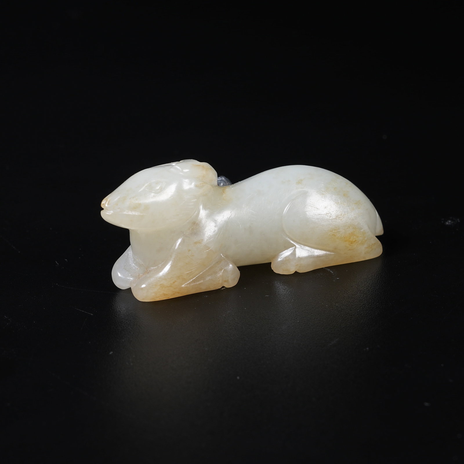 A HETIAN JADE RECUMBENT SHEEP ORNAMENT (1 of 8)