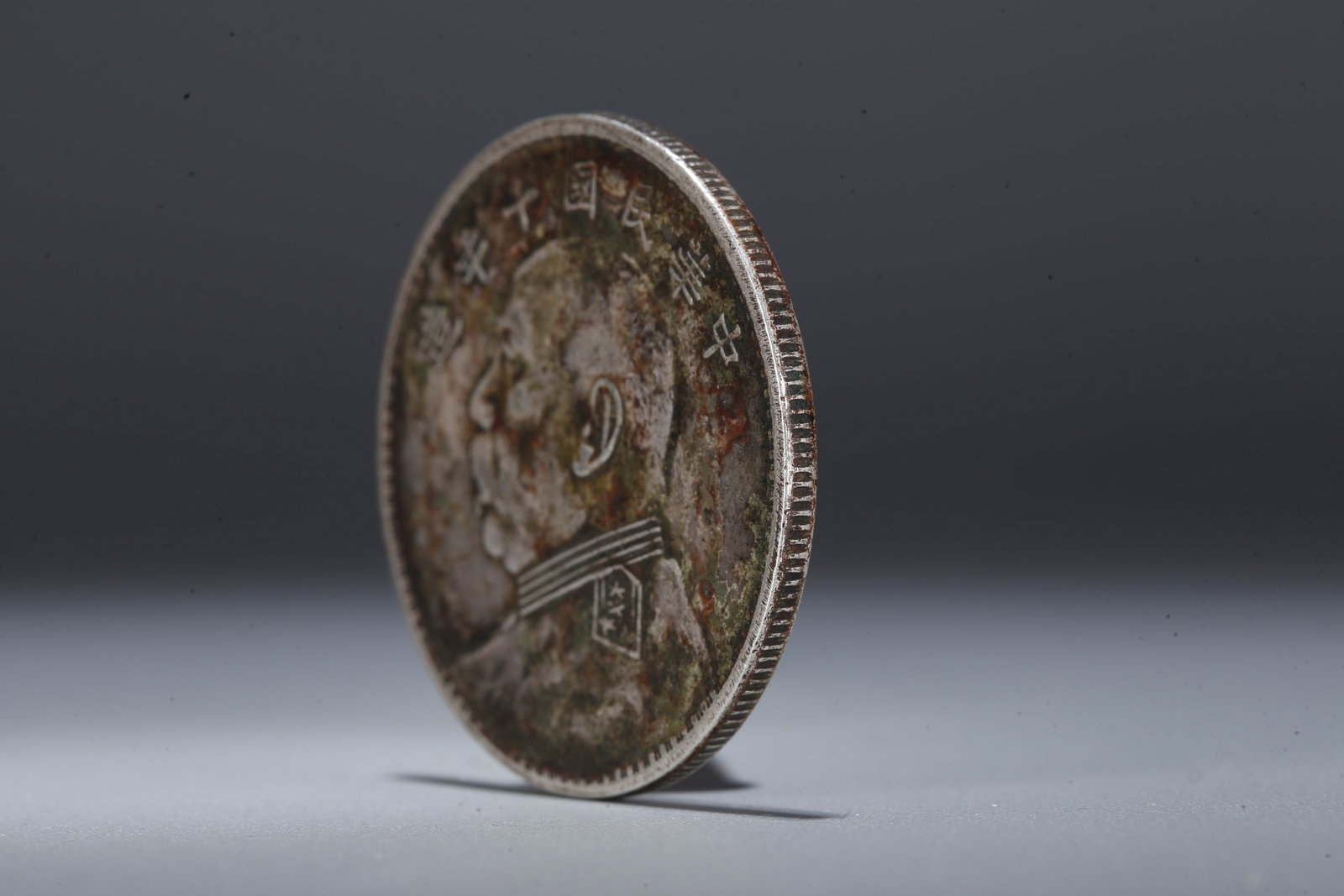 A SILVER DOLLAR COIN - 2