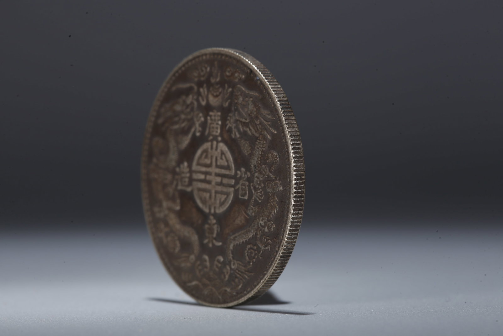 A SILVER DOLLAR COIN - 2