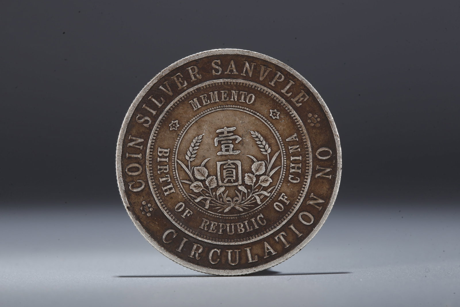 A SILVER DOLLAR COIN - 3