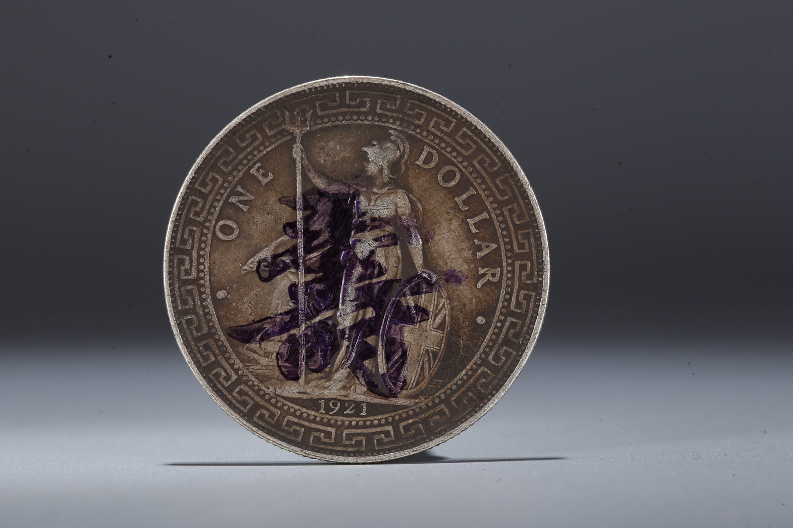 A SILVER DOLLAR COIN - 3