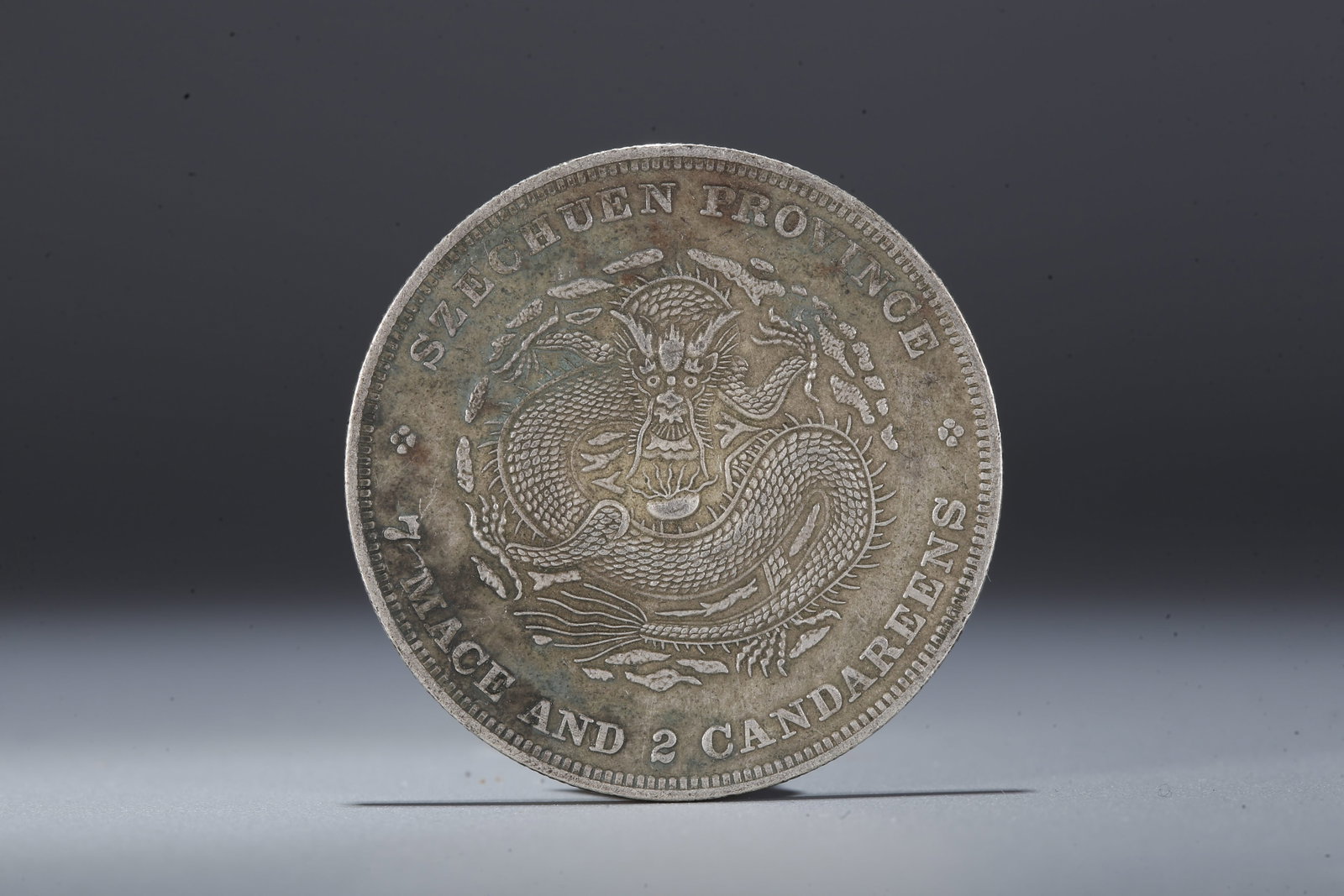 A SILVER DOLLAR COIN - 3