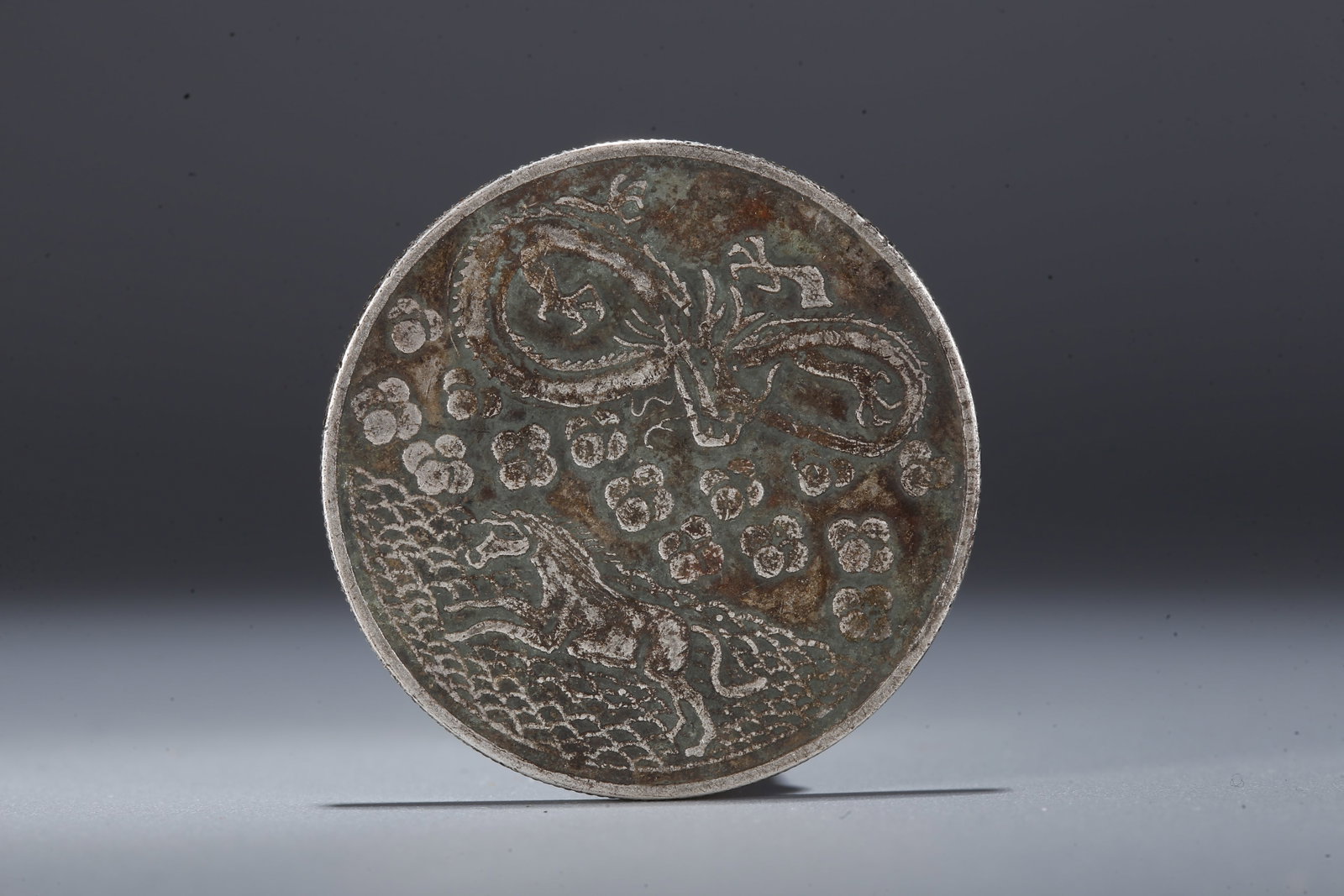 A SILVER DOLLAR COIN - 3