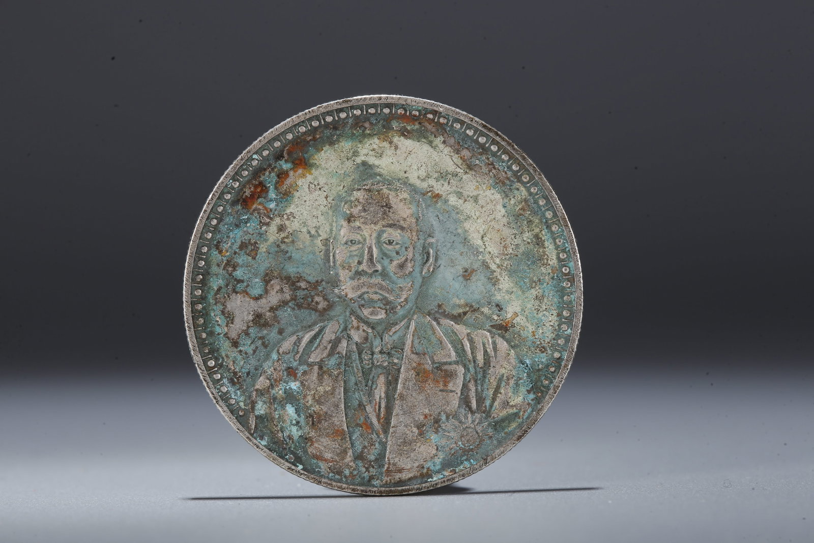 A SILVER DOLLAR COIN - 3