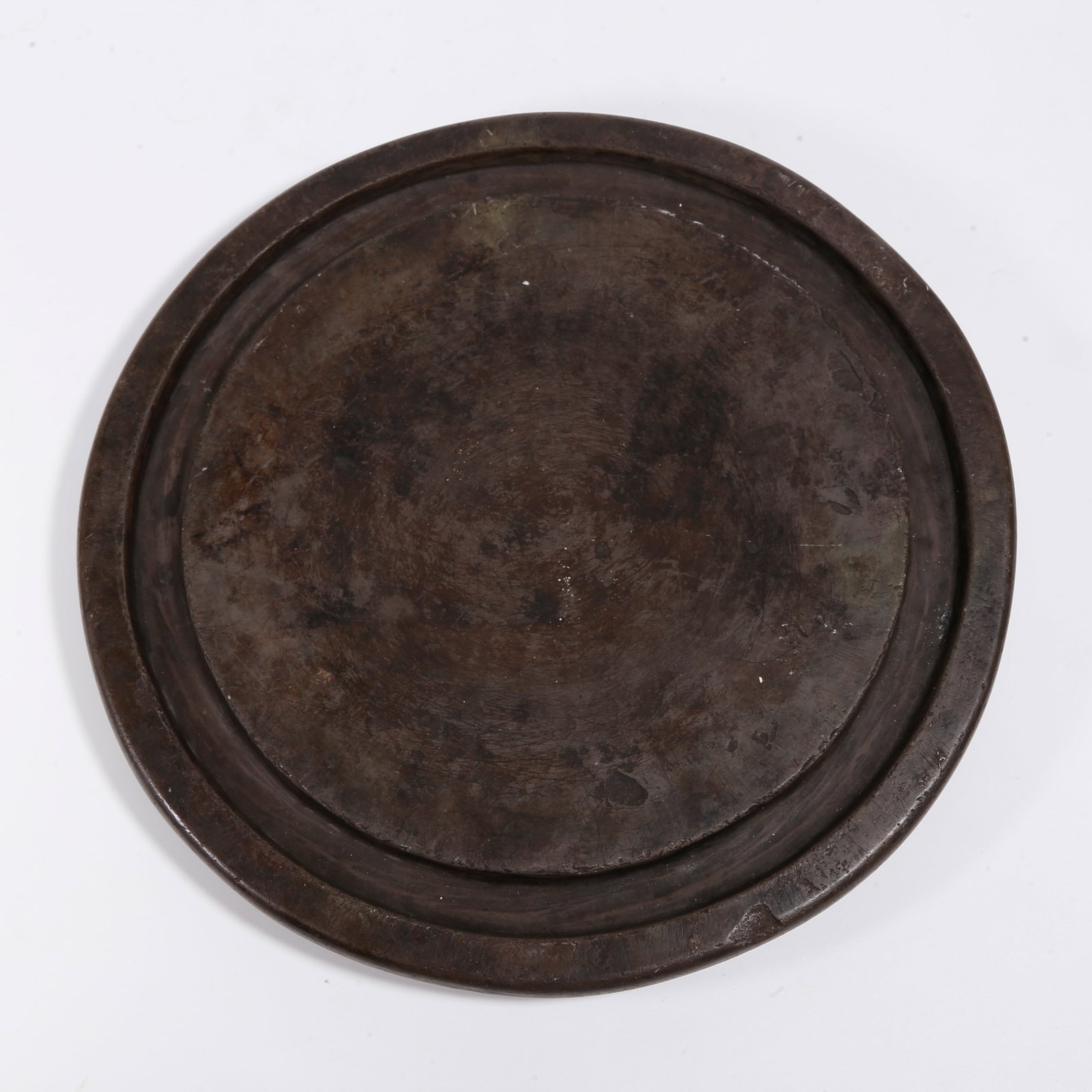 A ROUND DUAN INKSTONE: Round Duan Inkstone