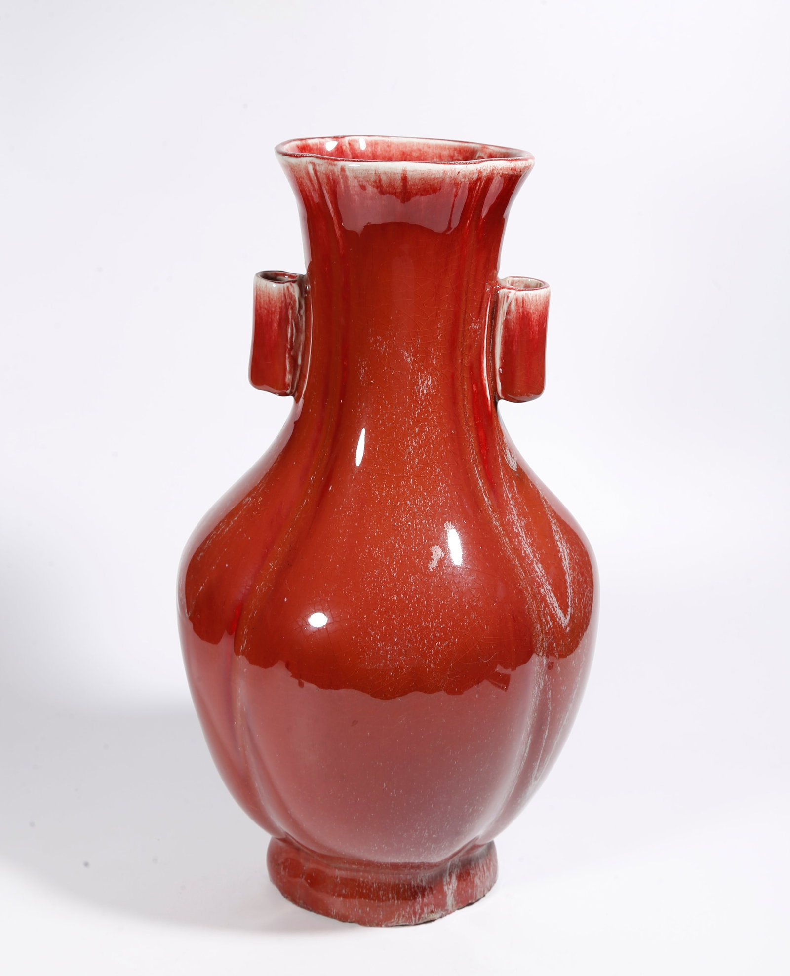 A RED GLAZE BEGONIA-STYLE VASE WITH TUBE EARS: Red Glaze Begonia-Style Vase with Tube Ears