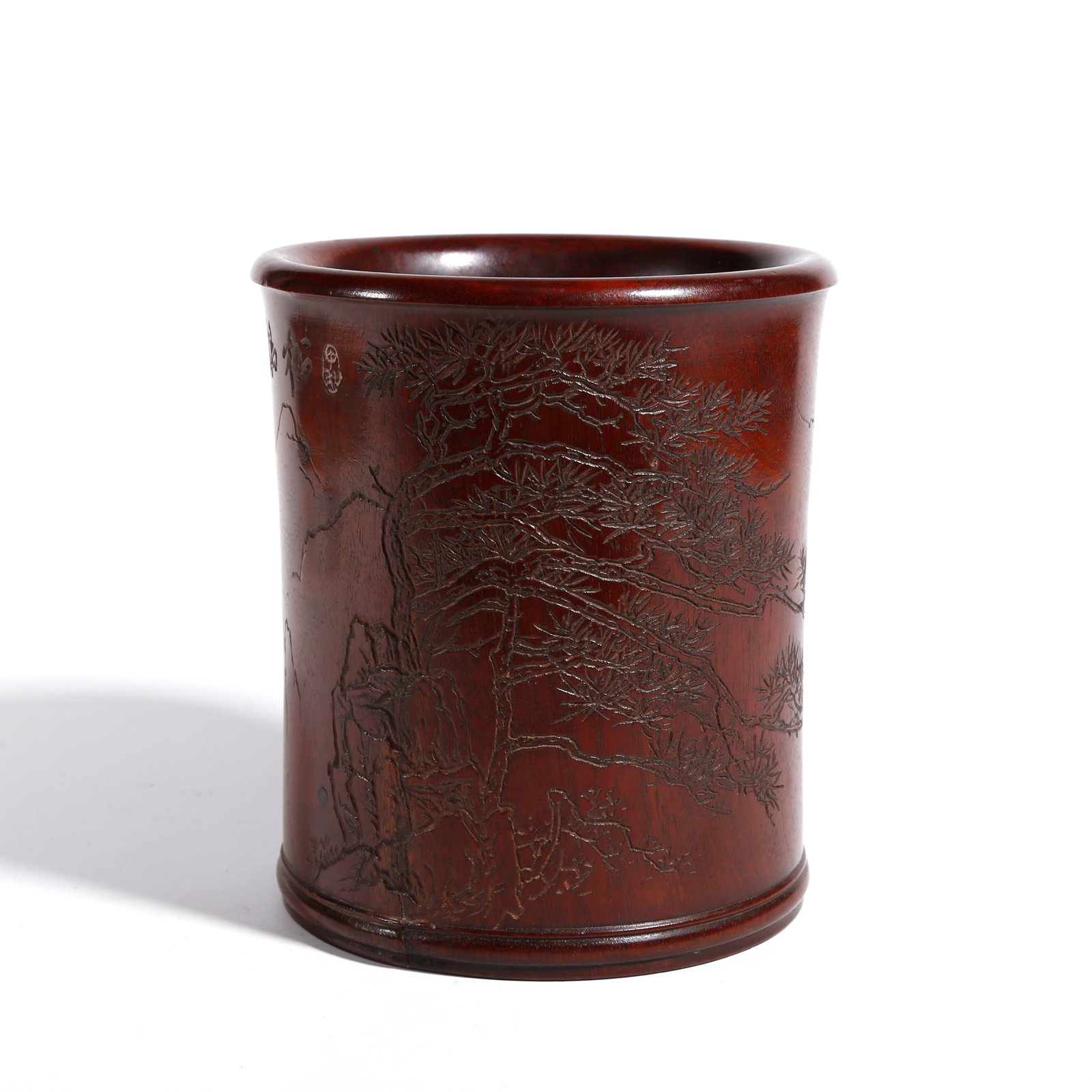 A RED SANDALWOOD CARVED BRUSH POT WITH BAMBOO, ROCK AND FLORAL PATTERN: Red Sandalwood Carved Brush Pot with Bamboo, Rock and Floral Pattern